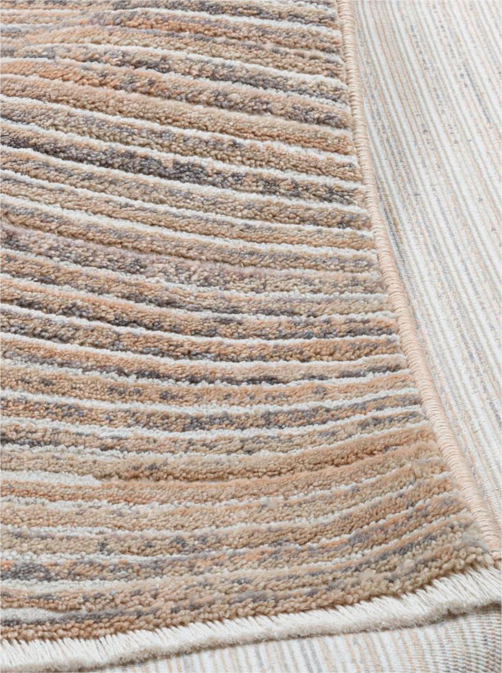 Theko Teppich - beige-meliert