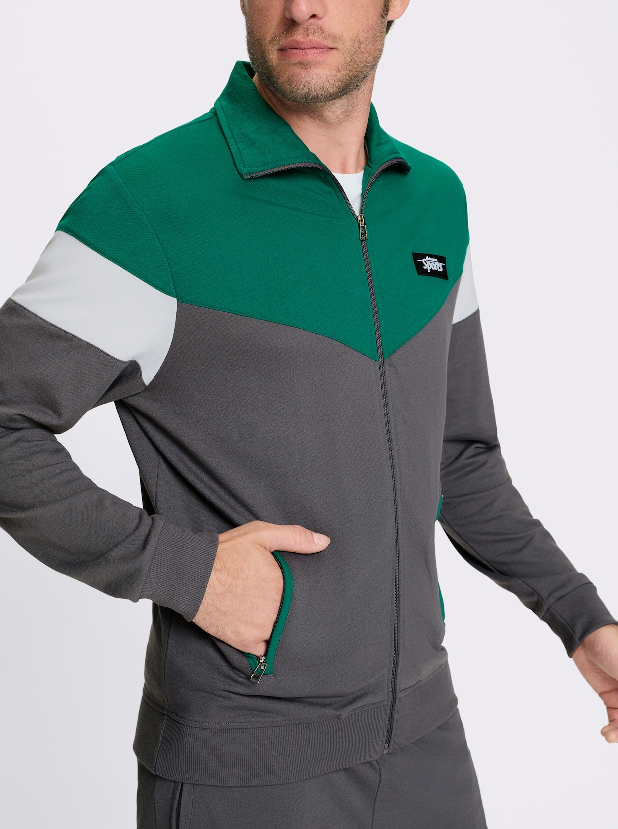 Catamaran Sports Freizeitanzug mit Reissverschluss-Taschen - grün