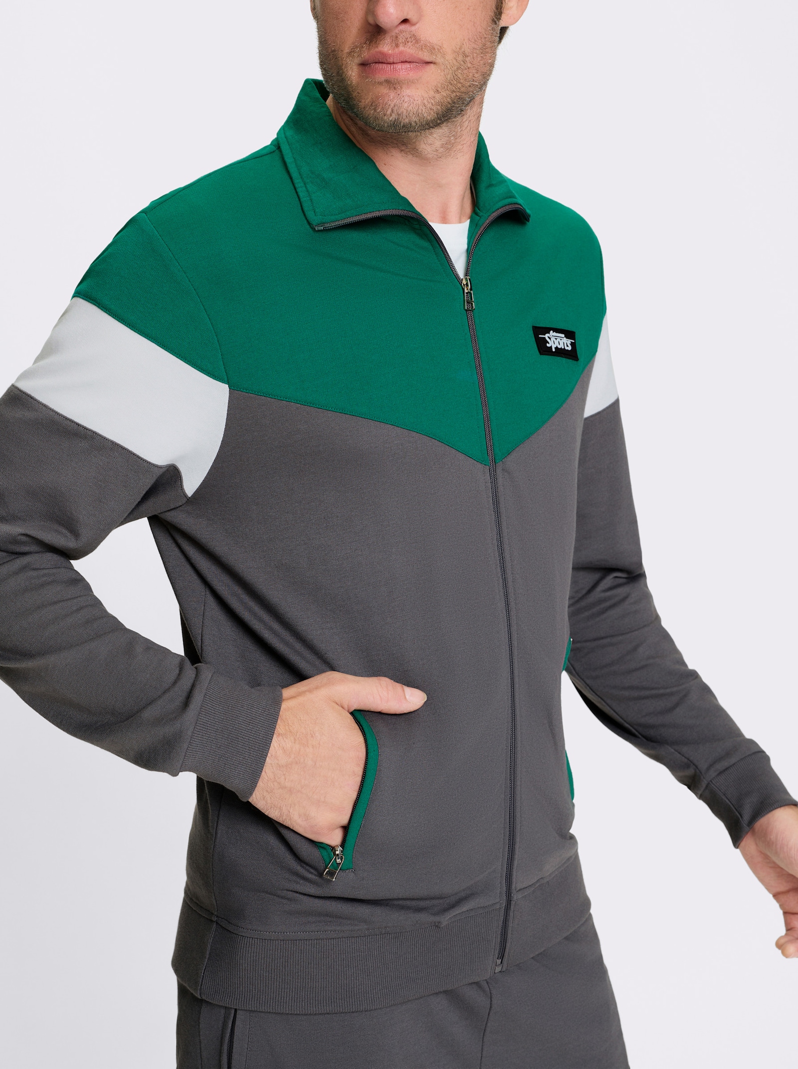 Catamaran Sports Freizeitanzug mit Reißverschluss-Taschen - grün