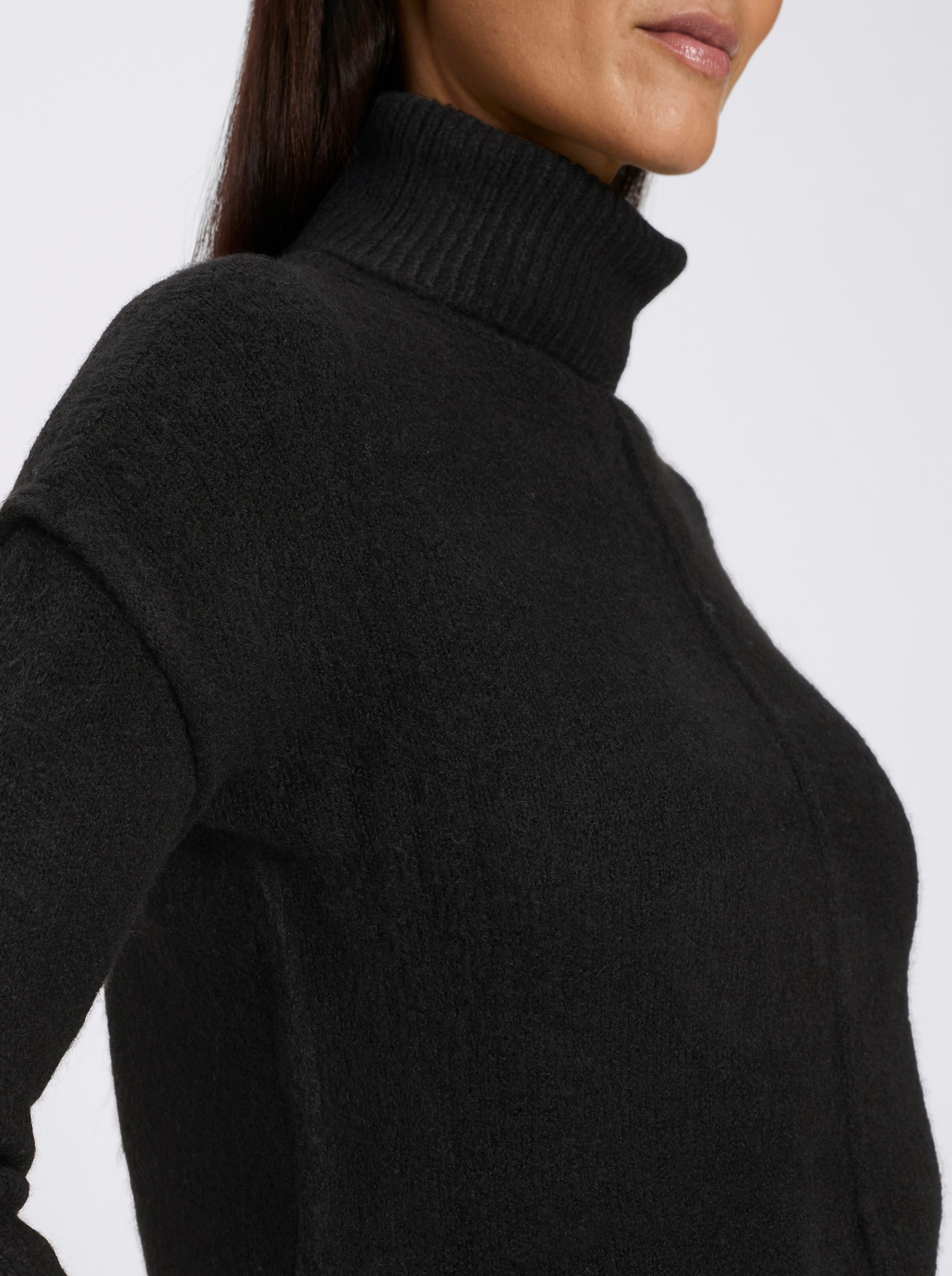 heine Rollkragenpullover mit eingearbeiteten Taschen - schwarz