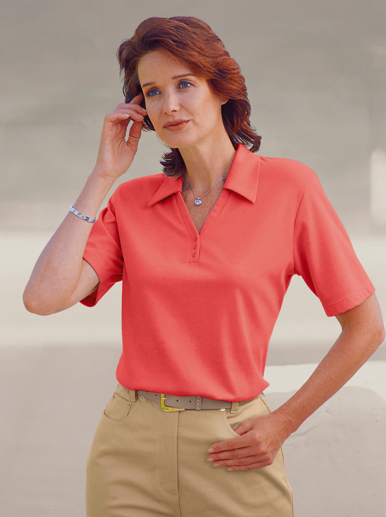 Poloshirt met drukknoopsluiting - koraalrood