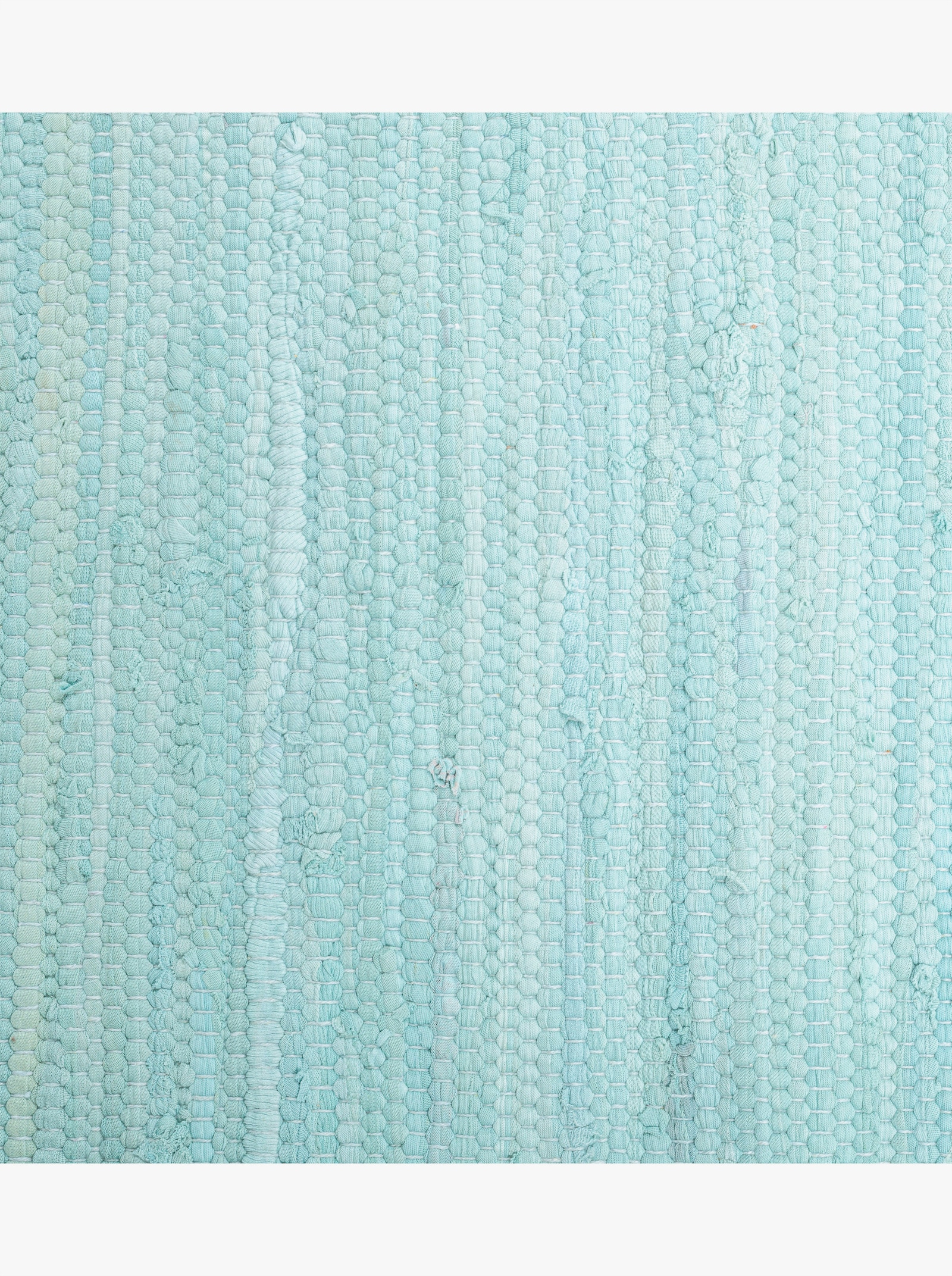 Theko Handwebteppich - hellblau