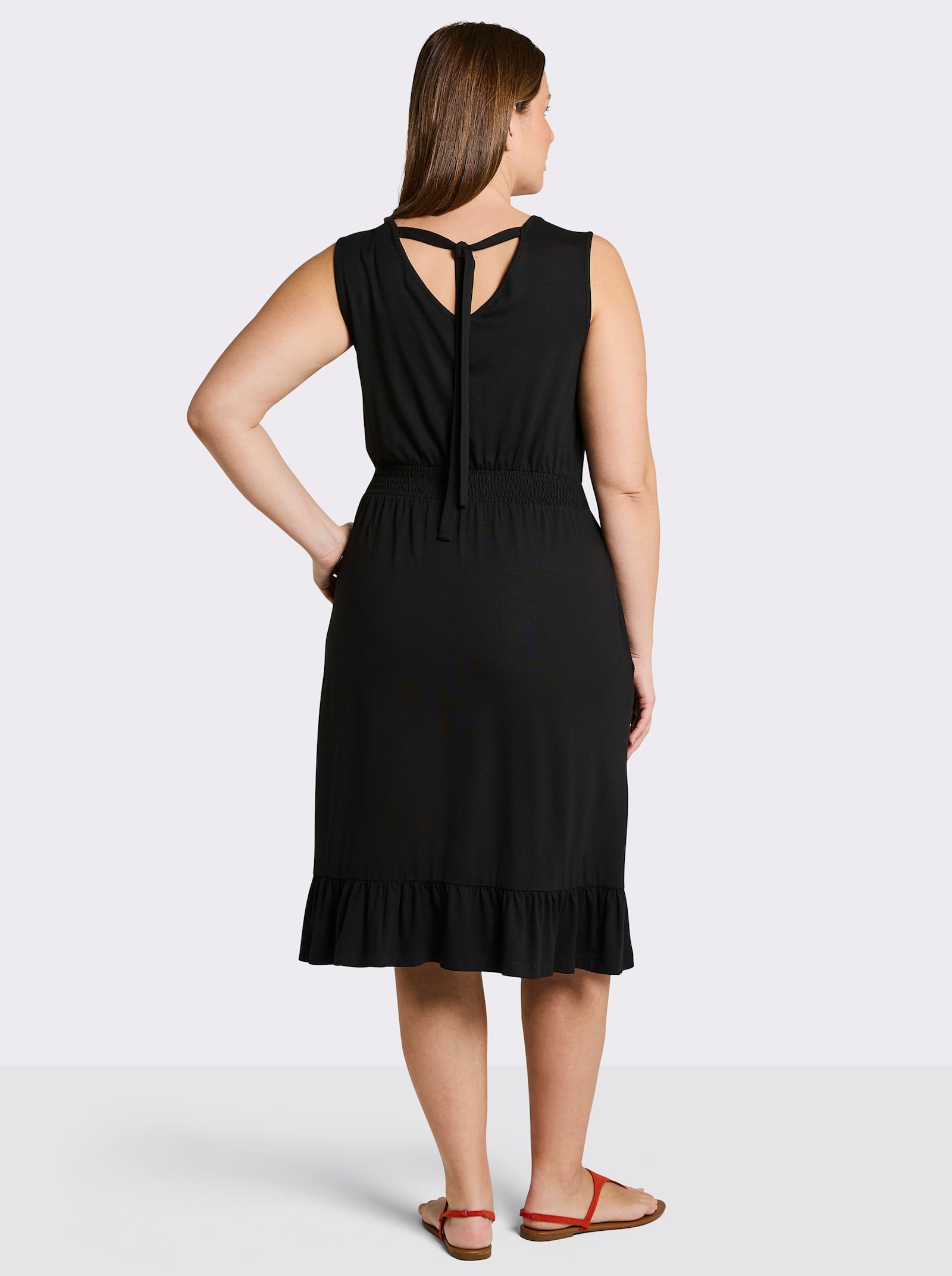 sheego Jerseykleid in Wickeloptik - schwarz