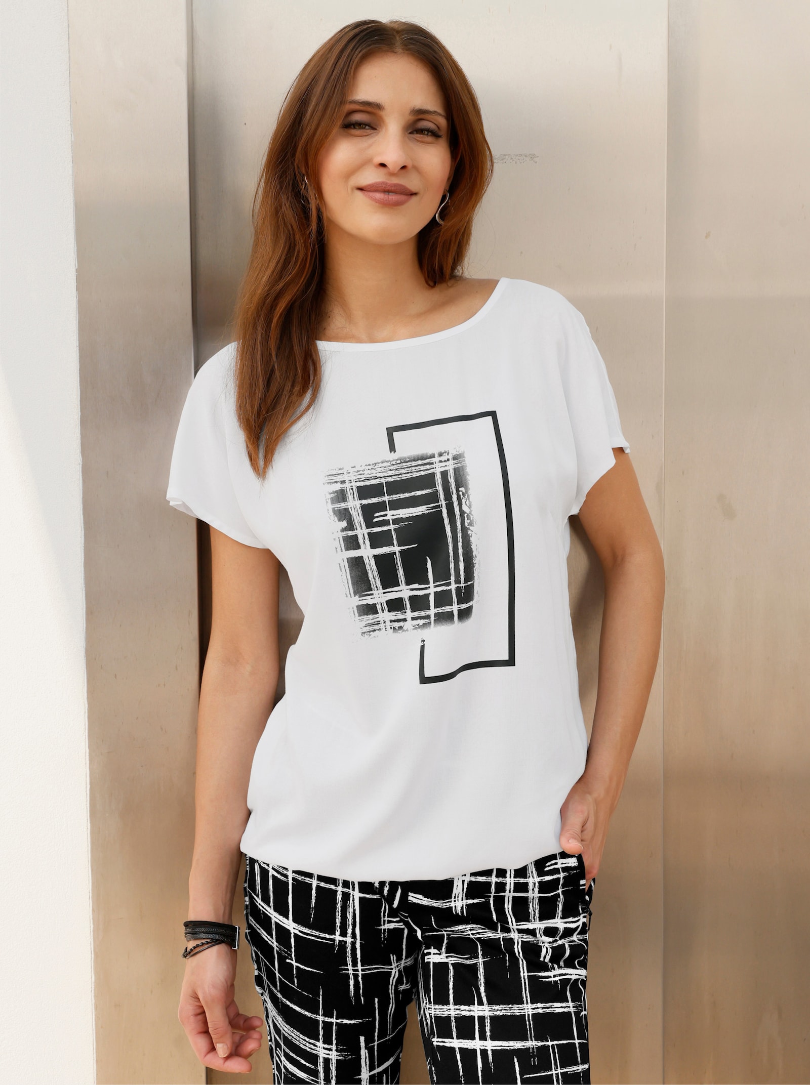 Schlupfbluse mit überschnittenen Schultern - weiß-schwarz-bedruckt