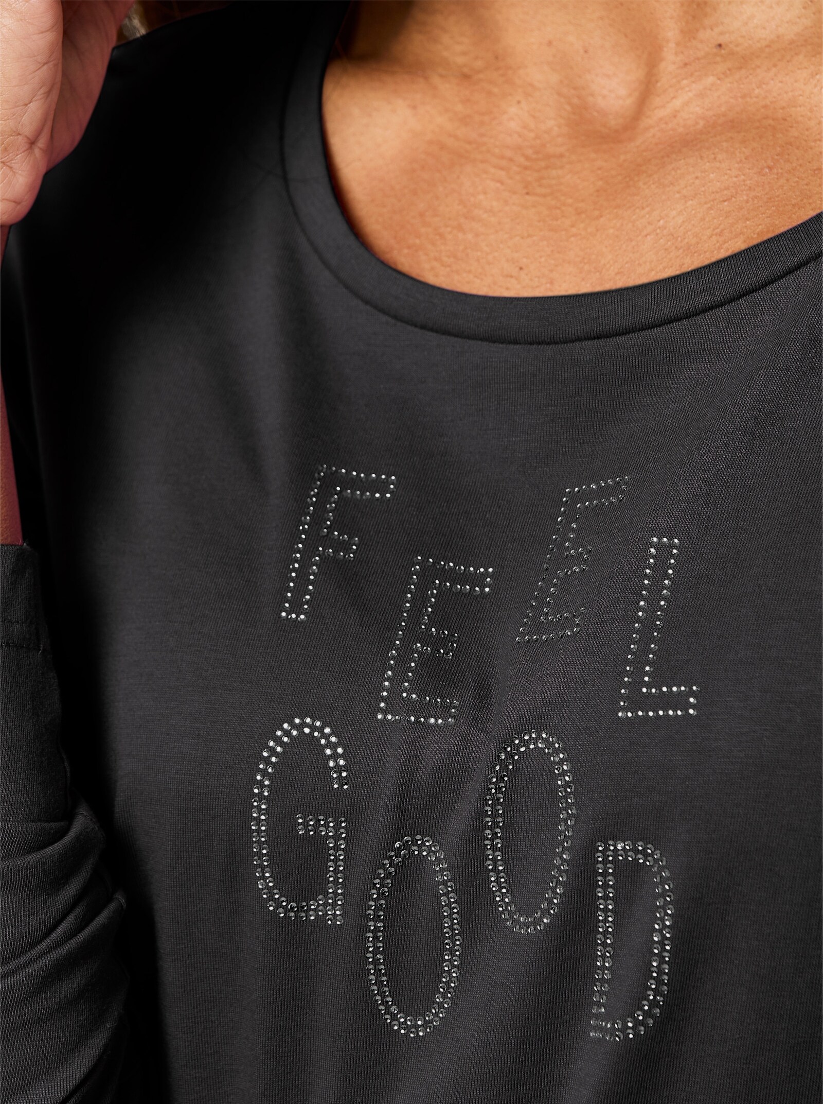 Langarmshirt mit Glitzer-Schriftzug - schwarz