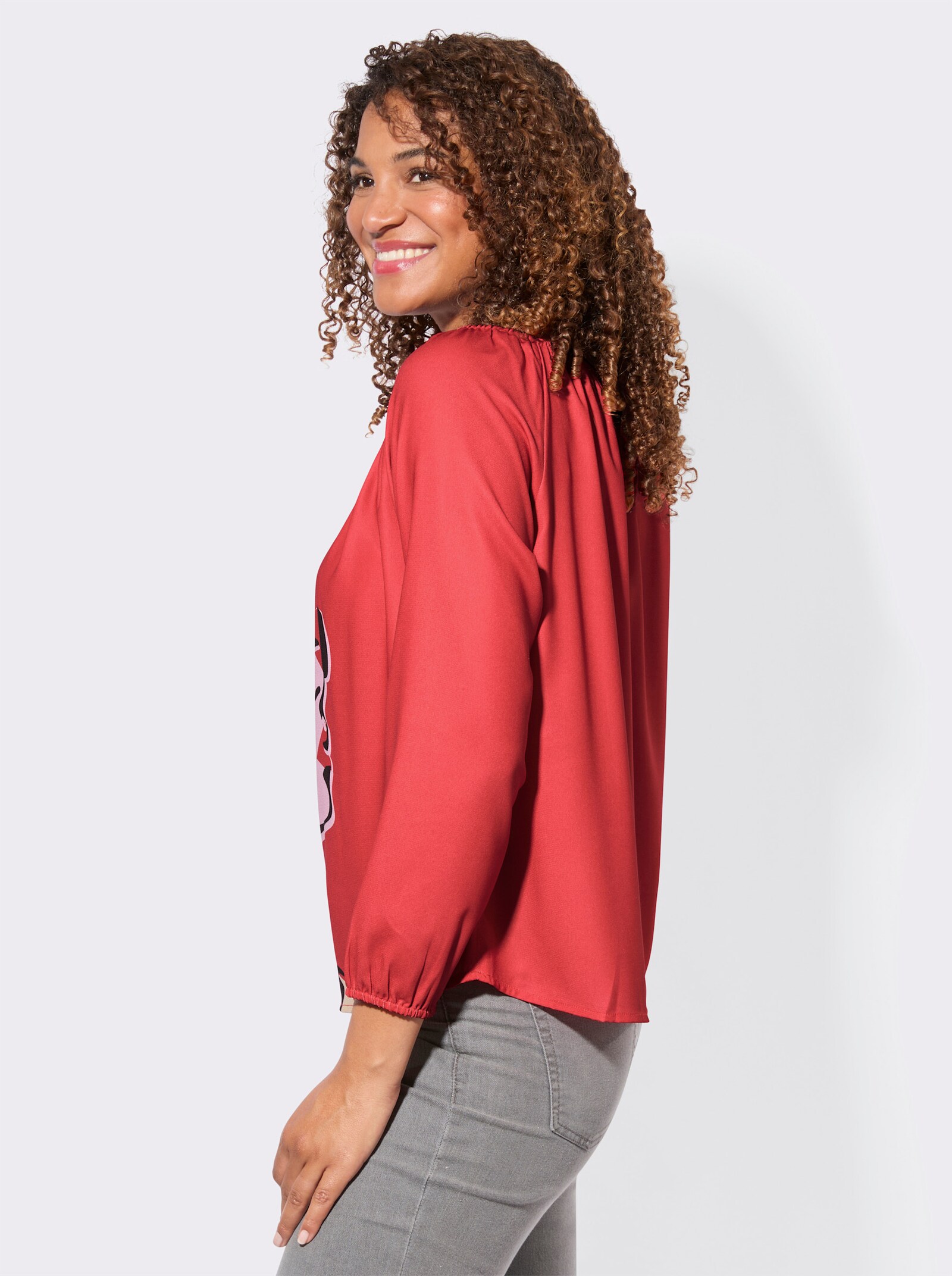 Druckbluse mit weitem, elastischem Ausschnitt - rot-rosé-bedruckt