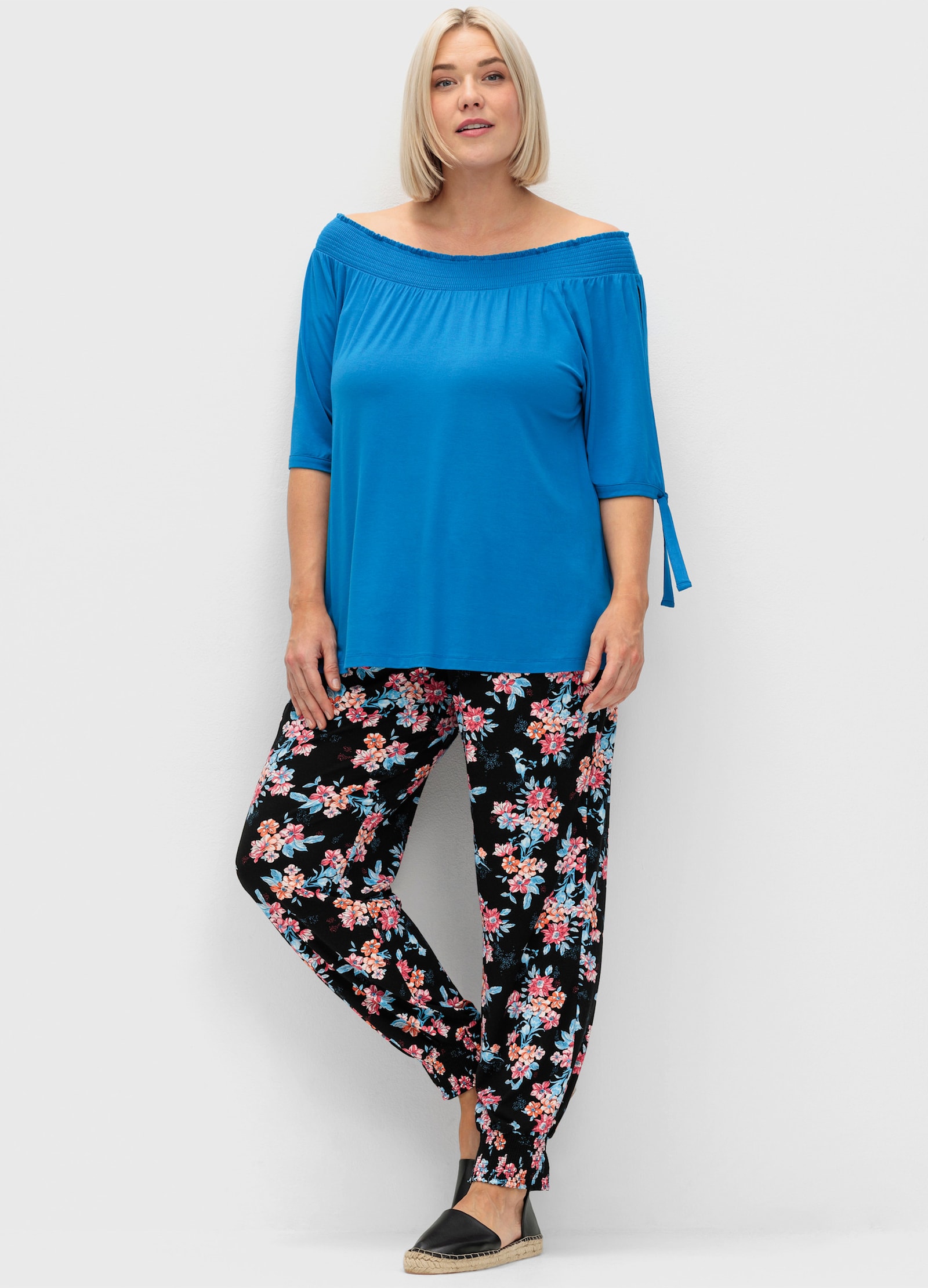 sheego Schlupfhose mit Smokbund und Taschen - schwarz-gemustert