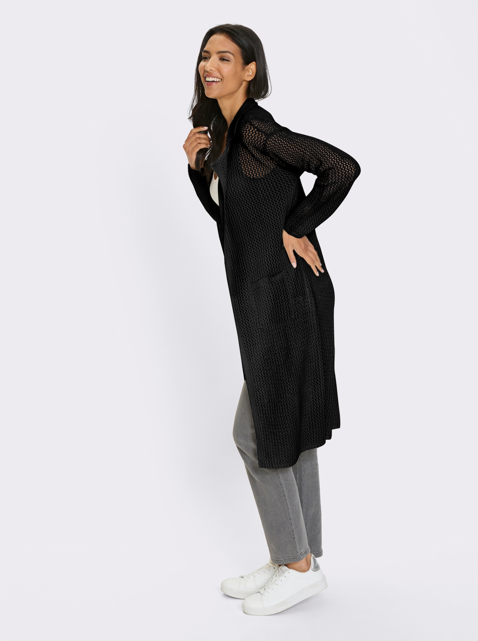 Lång kofta med hålmönster - svart