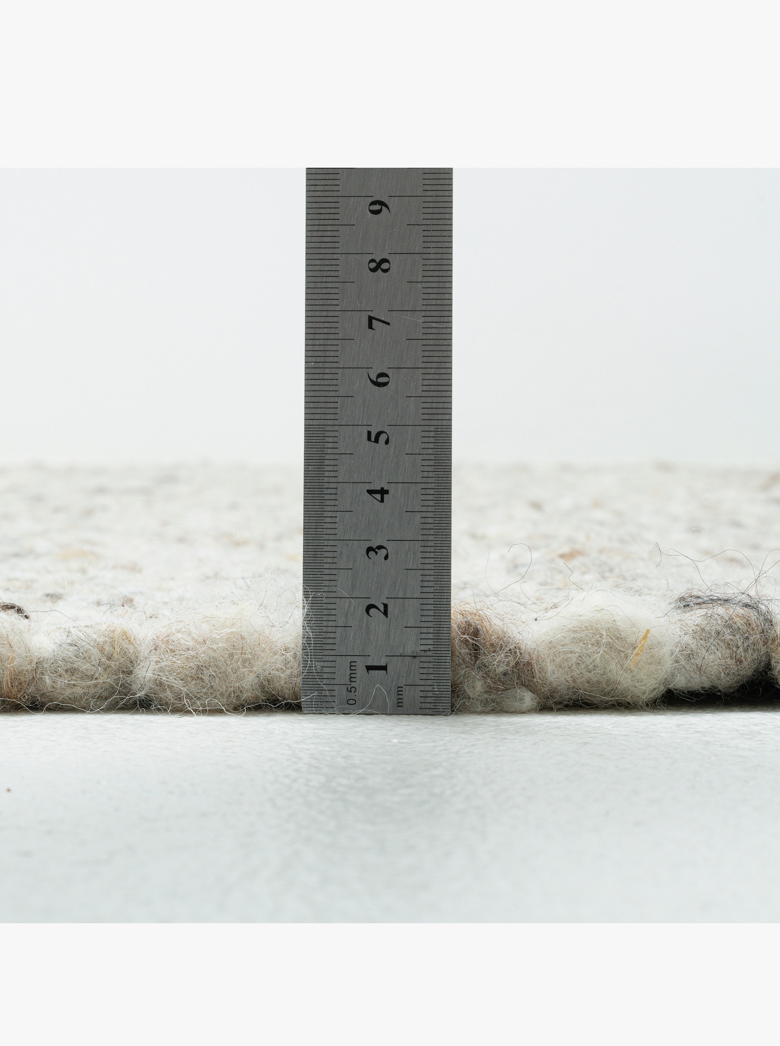 Theko Handwebteppich - sand-meliert