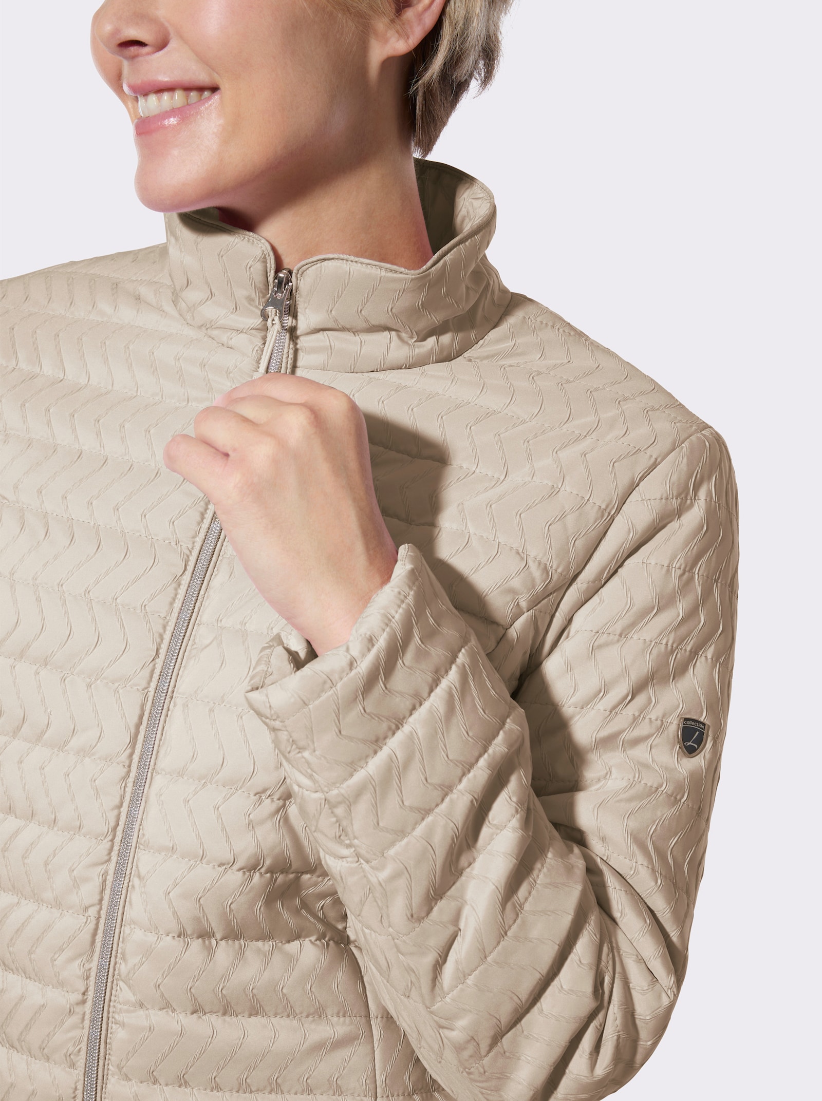 Steppjacke mit Reißverschluss-Taschen - beige