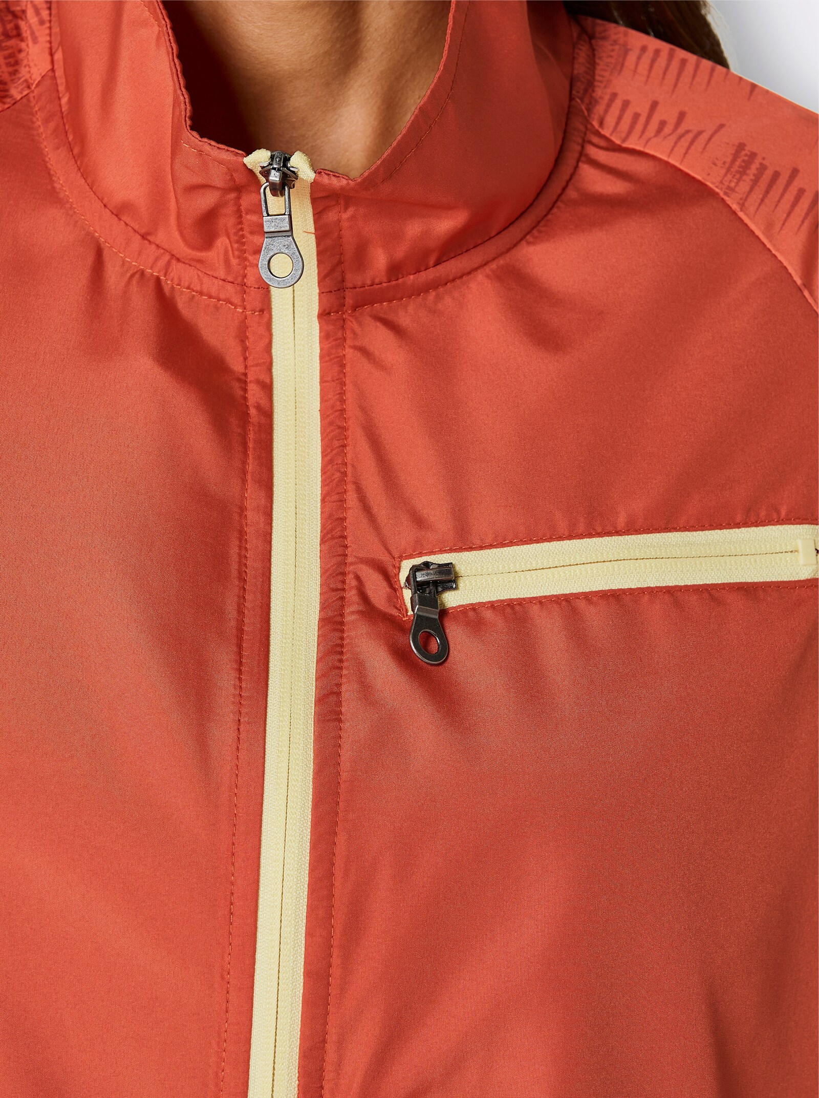 Funktionsjacke mit Reißverschluss-Brusttasche - orange