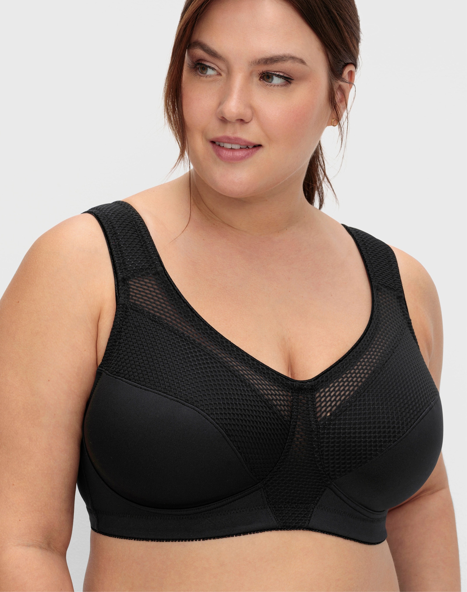 sheego Sportbeha zonder beugel met netinzetten - zwart