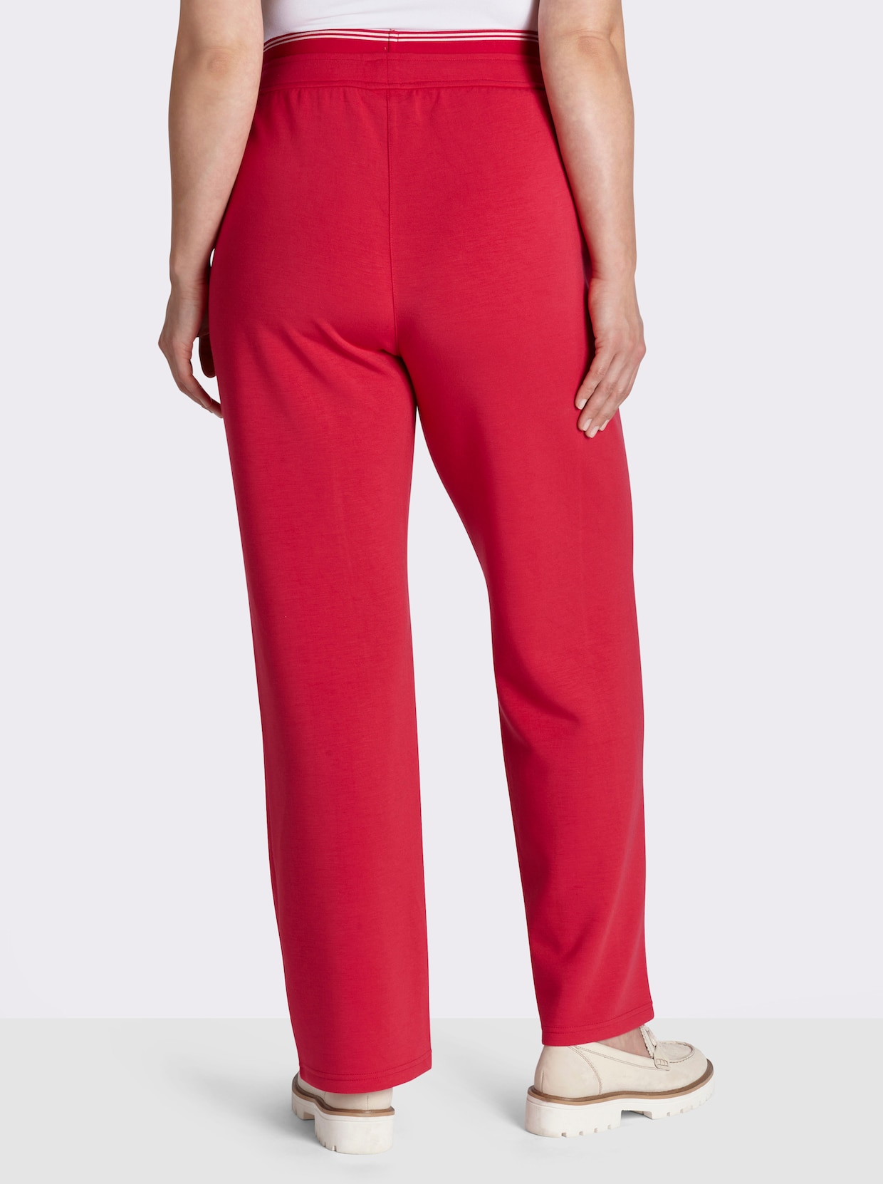 sheego Pantalon en jersey avec ceinture extensible rayée - fraise
