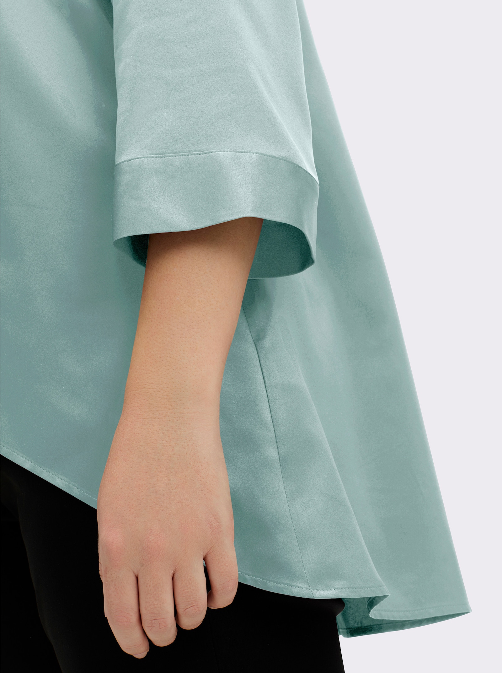 sheego Satinbluse mit verkürztem Saum vorn - kalkmint