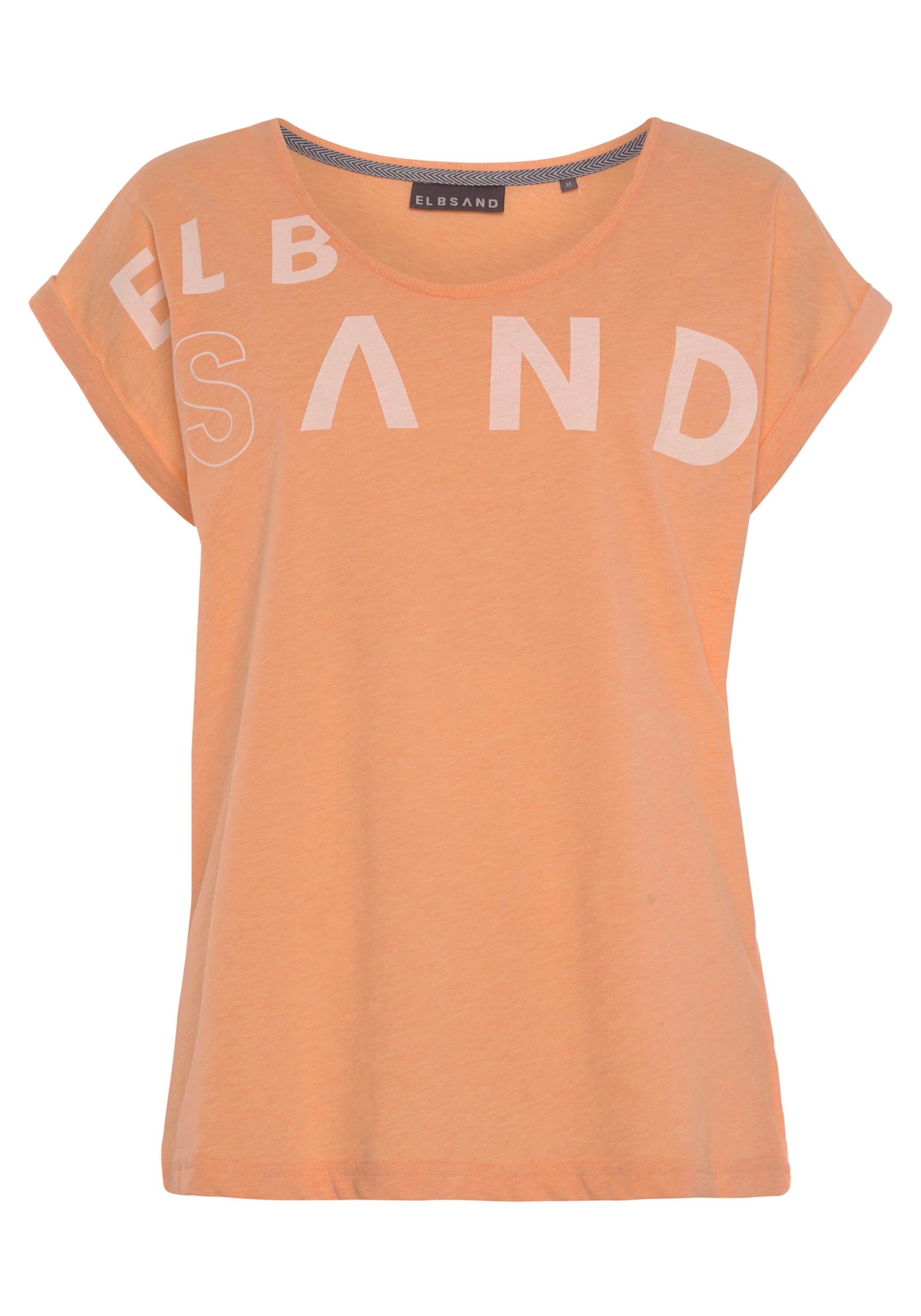Orange  günstig Kaufen-T-Shirt in orange von Elbsand. T-Shirt in orange von Elbsand <![CDATA[Bequemes T-Shirt von Elbsand mit großem Logodruck vorn. Gerippter Rundhalsausschnitt und kurze Ärmel mit Aufschlag. Gerader Saumabschluss. Gut kombinierbar. Angenehm weicher Jersey.]]
