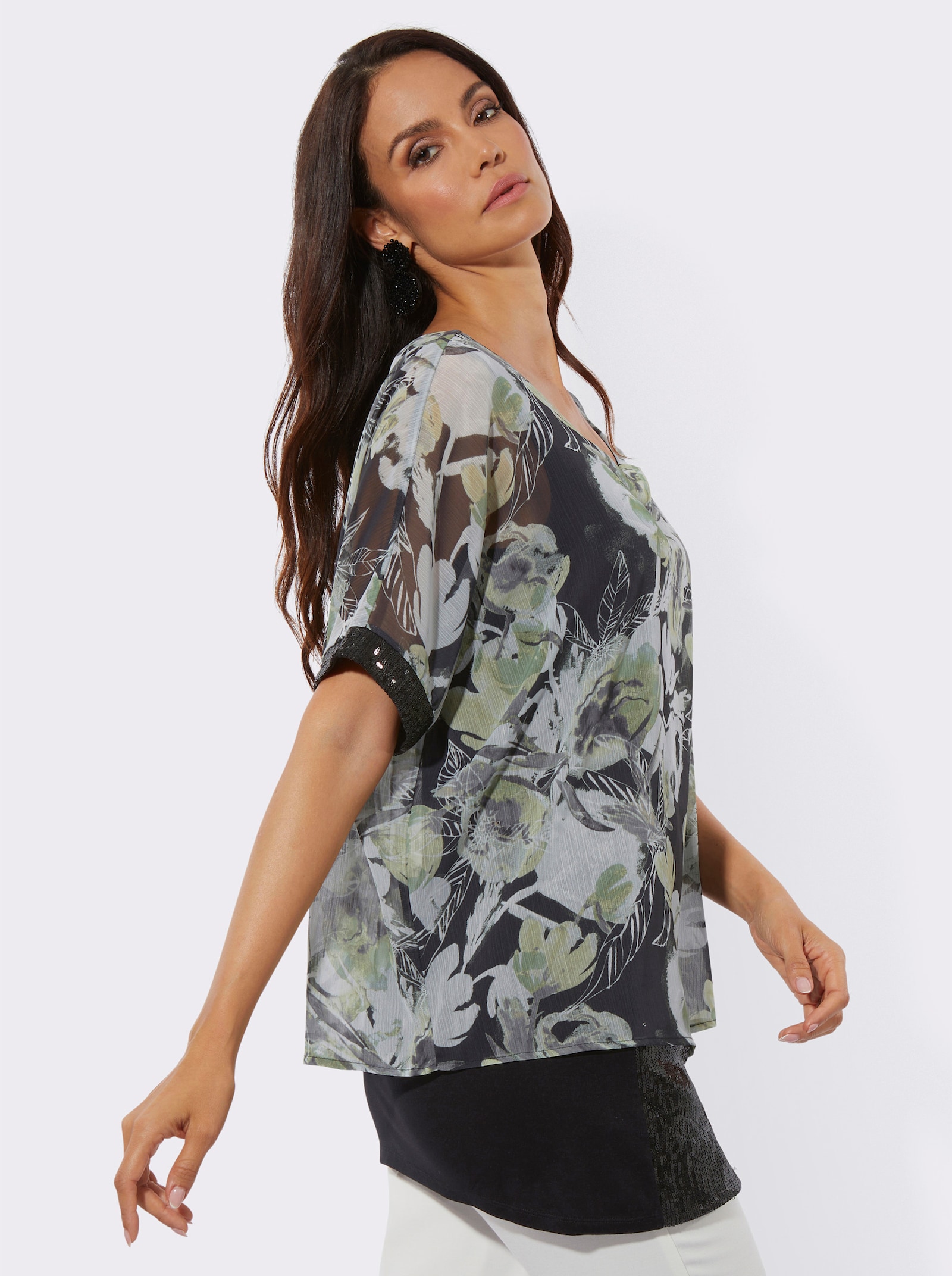 Kurzarmbluse mit schimmernden Pailletten - schwarz-lindgrün-bedruckt