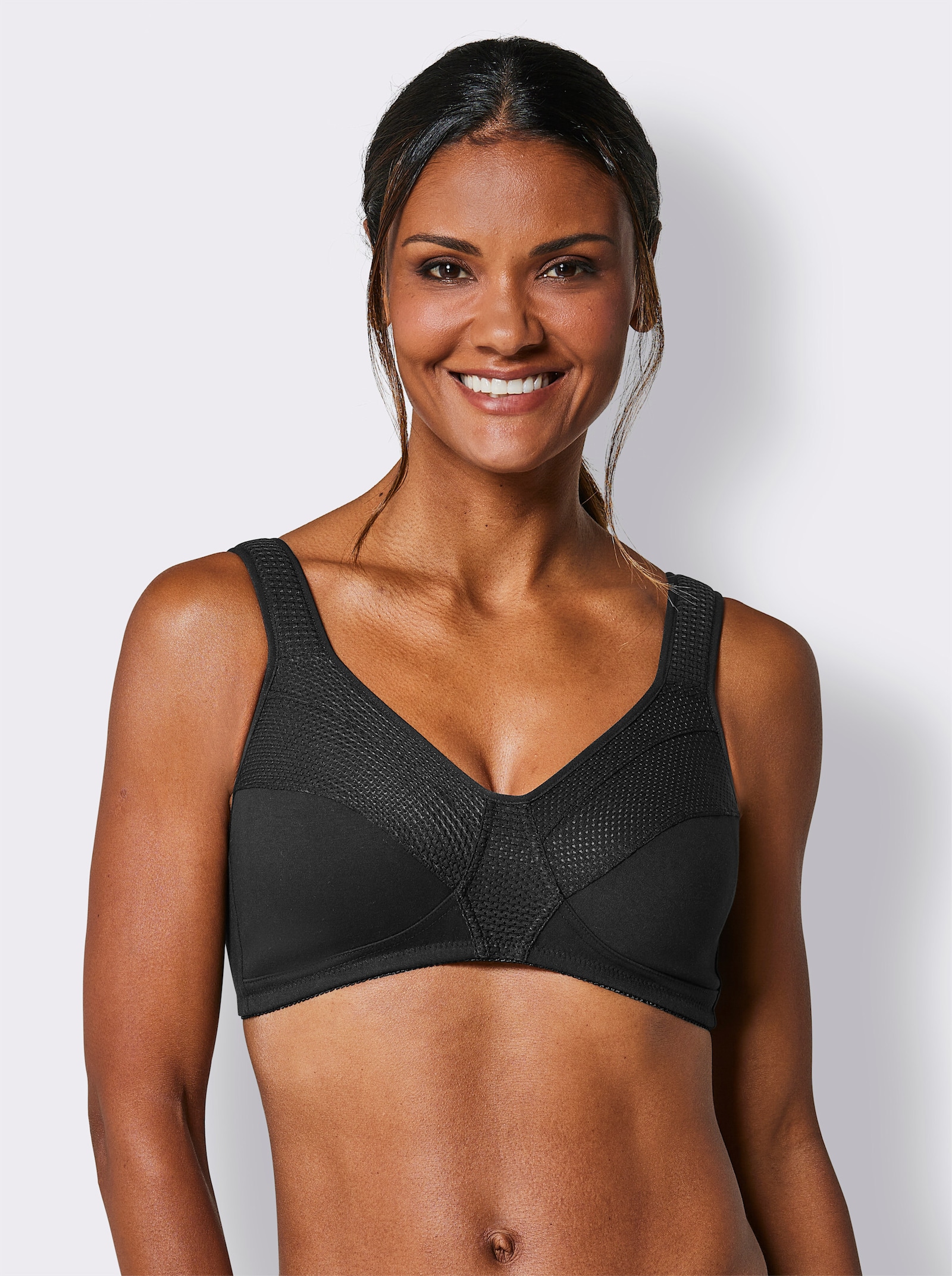 wäschepur Soutien-gorge sportif sans armatures avec empiècements en maille transparents - noir