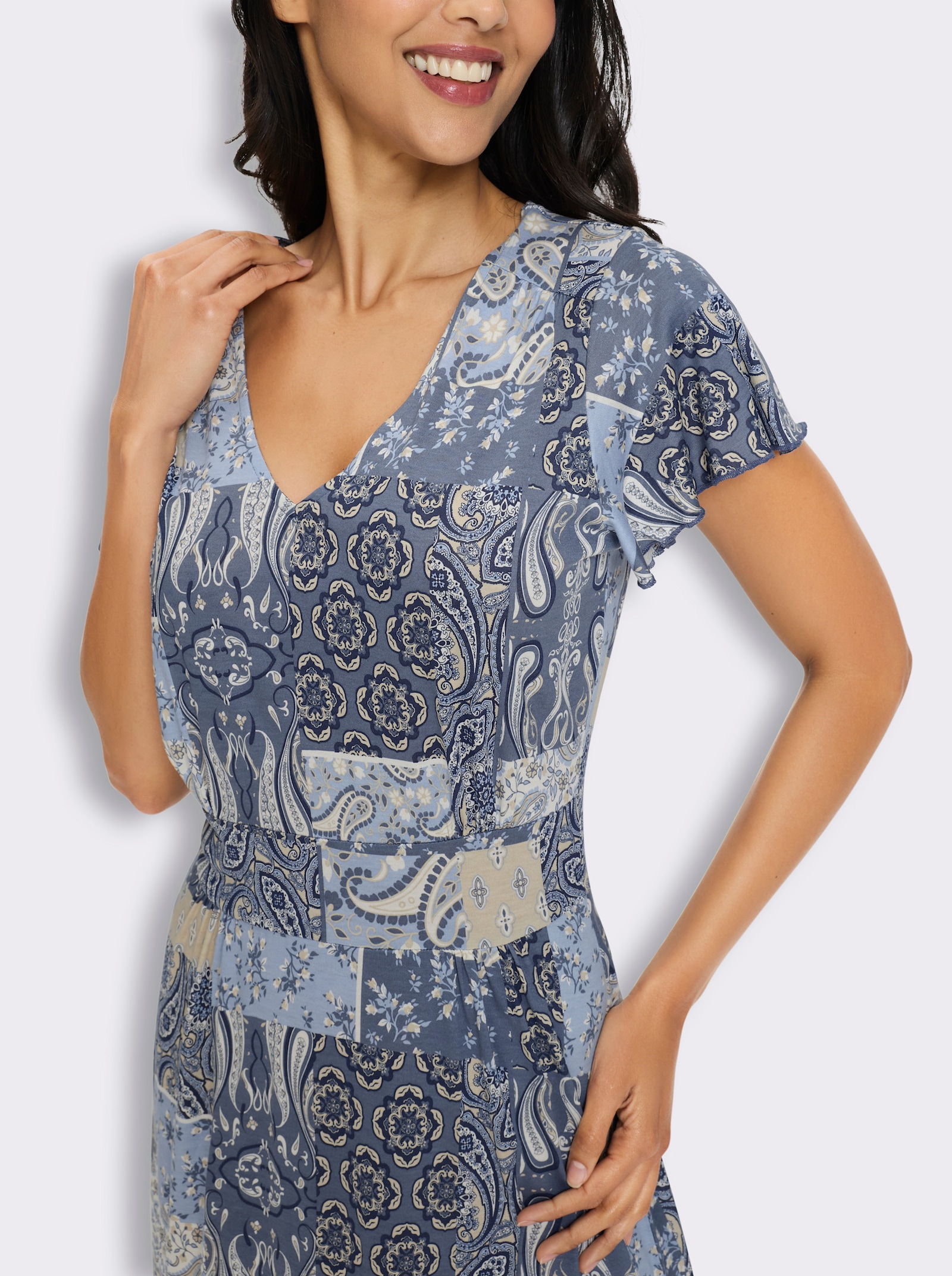 Jerseykleid mit ausgestelltem Rockteil - bleu-sand-bedruckt