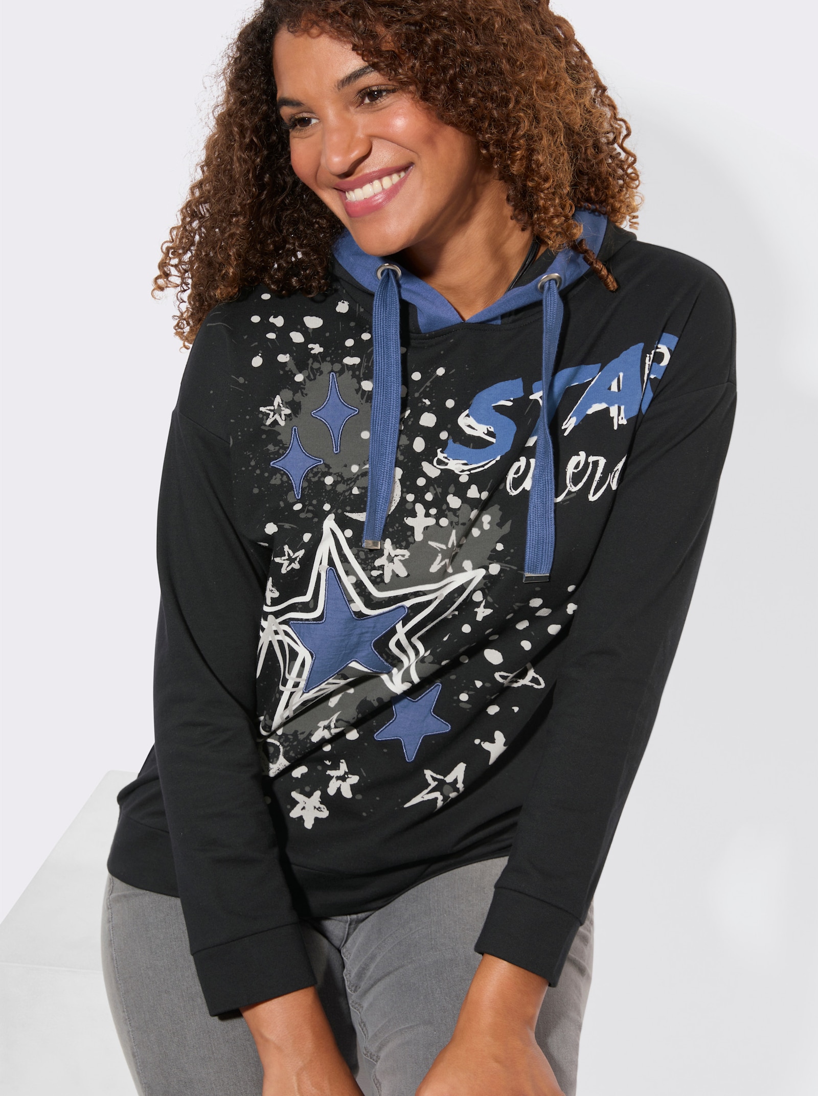 Sweatshirt mit Sternen-Print vorne - schwarz