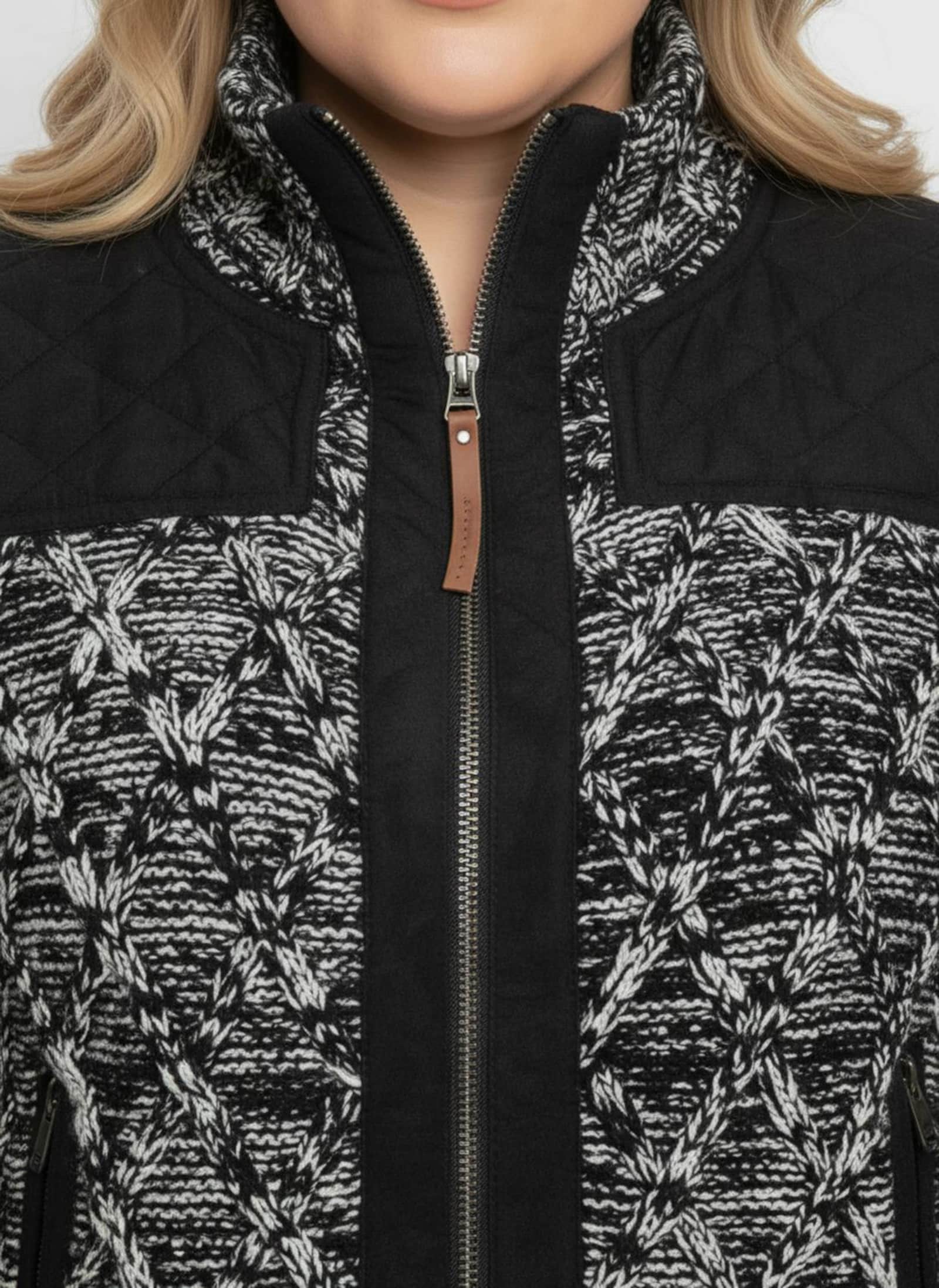 Strickjacke , hinten glatt gestrickt - schwarz-meliert