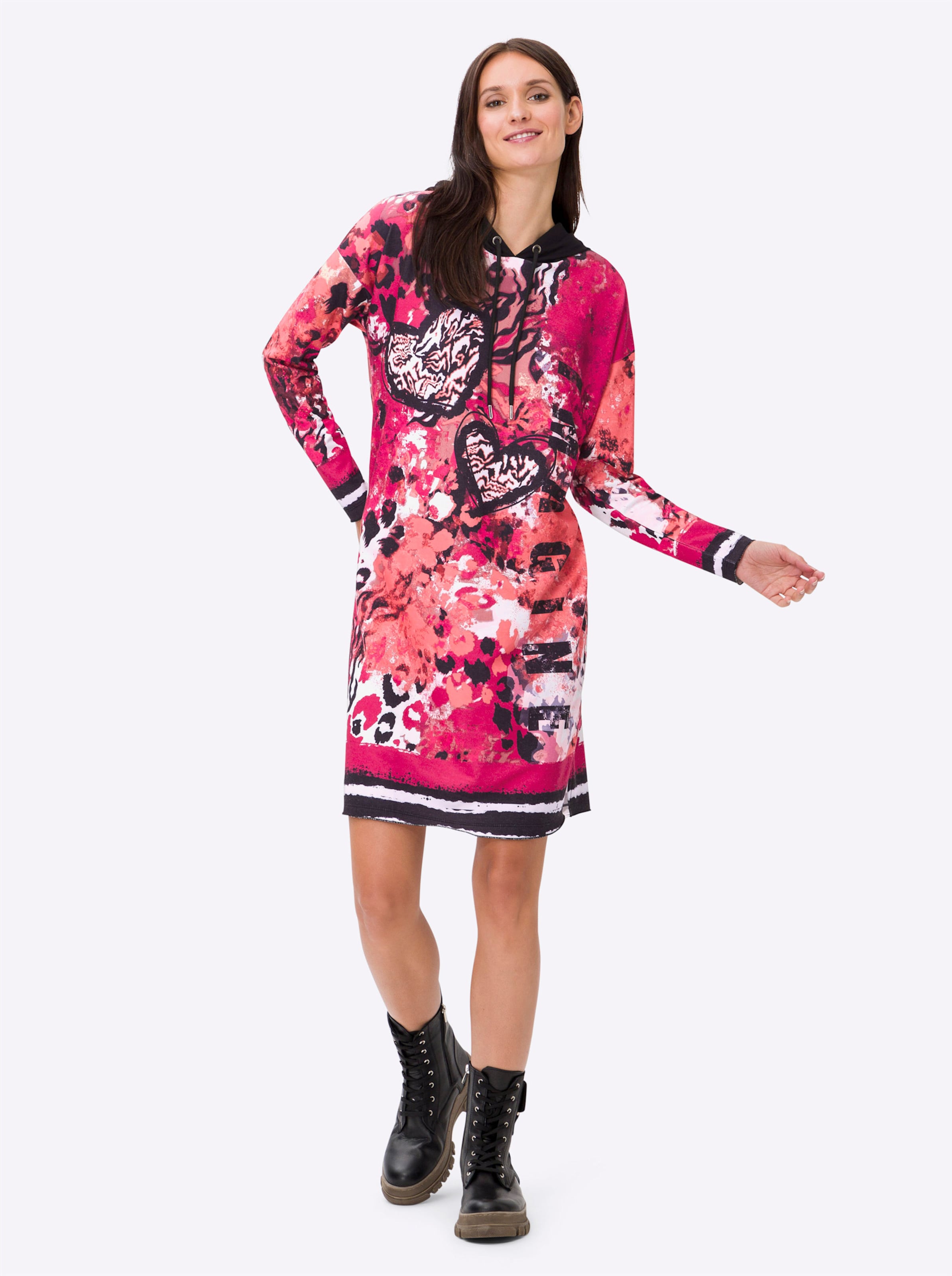 Mi Mix günstig Kaufen-Jersey-Kleid in pink-schwarz-bedruckt von heine. Jersey-Kleid in pink-schwarz-bedruckt von heine <![CDATA[Jersey-Kleid im auffallenden Muster-Mix. Lässige Kapuze mit Tunnelzug und Bindeband. Gerade Form mit überschnittener Schulter und Langarm. Unterst