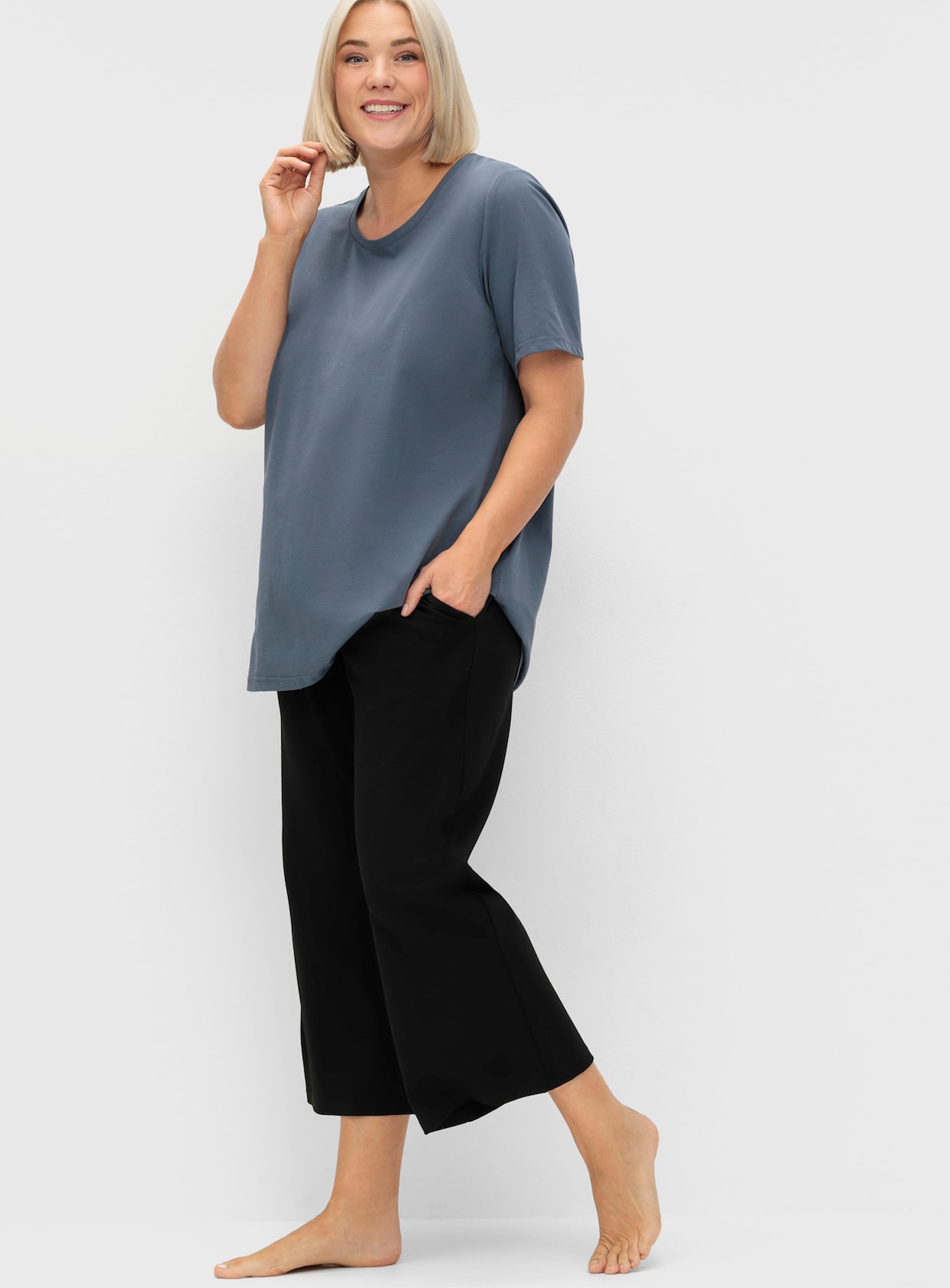 sheego Sportbroek - zwart