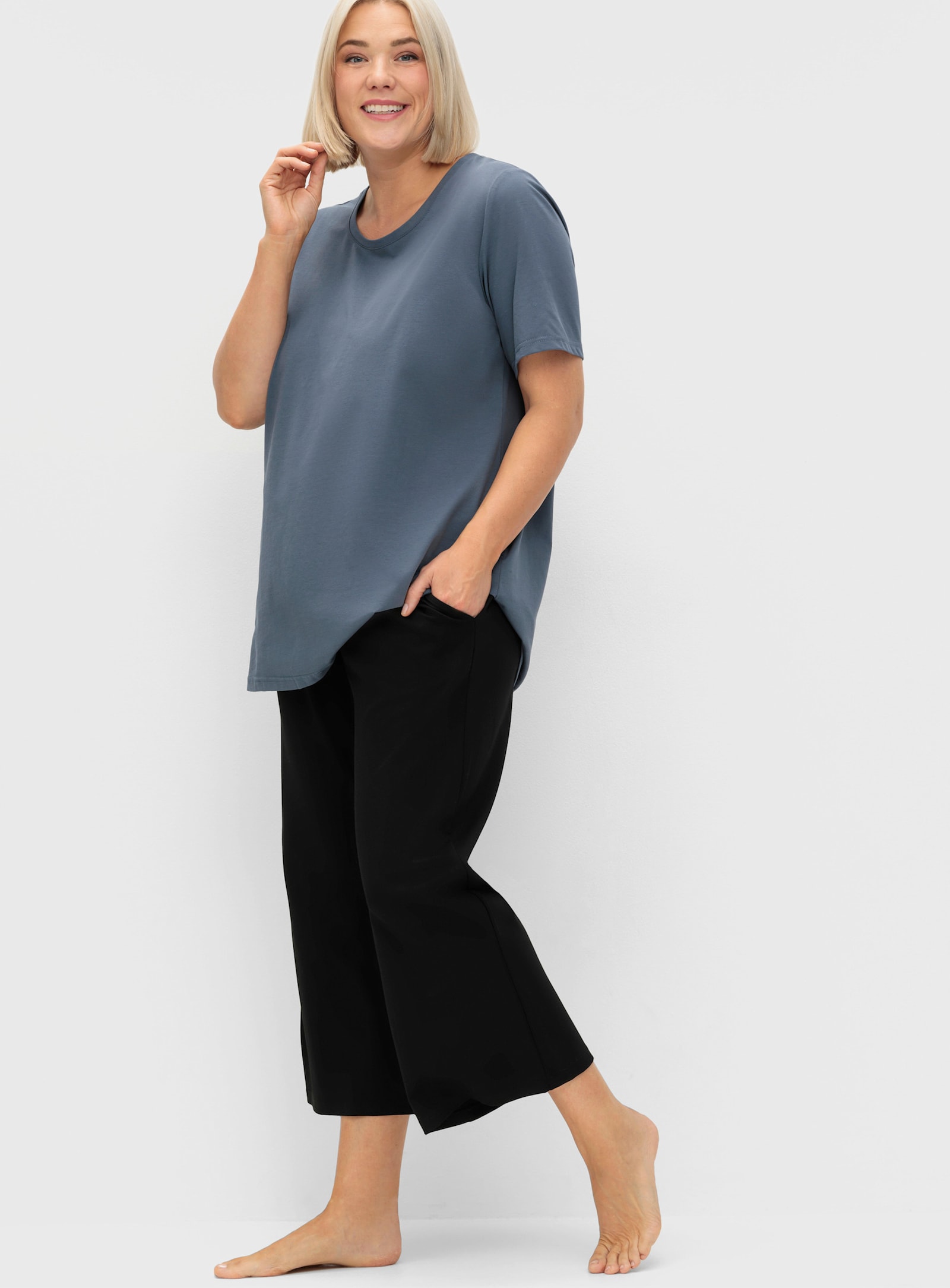 sheego Sporthose in 7/8-Länge - schwarz