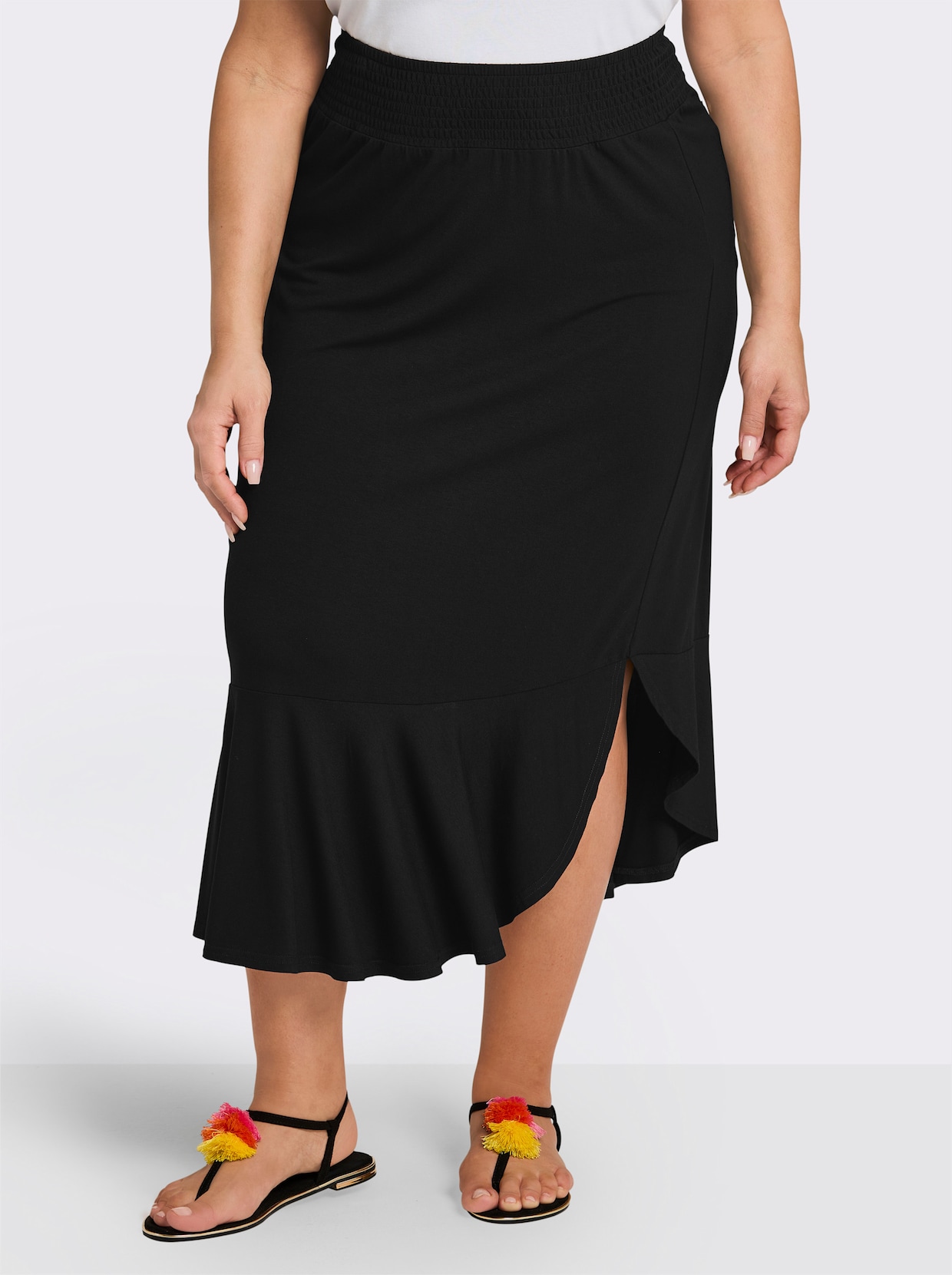 sheego Schlupfrock mit asymmetrischem Saum - schwarz