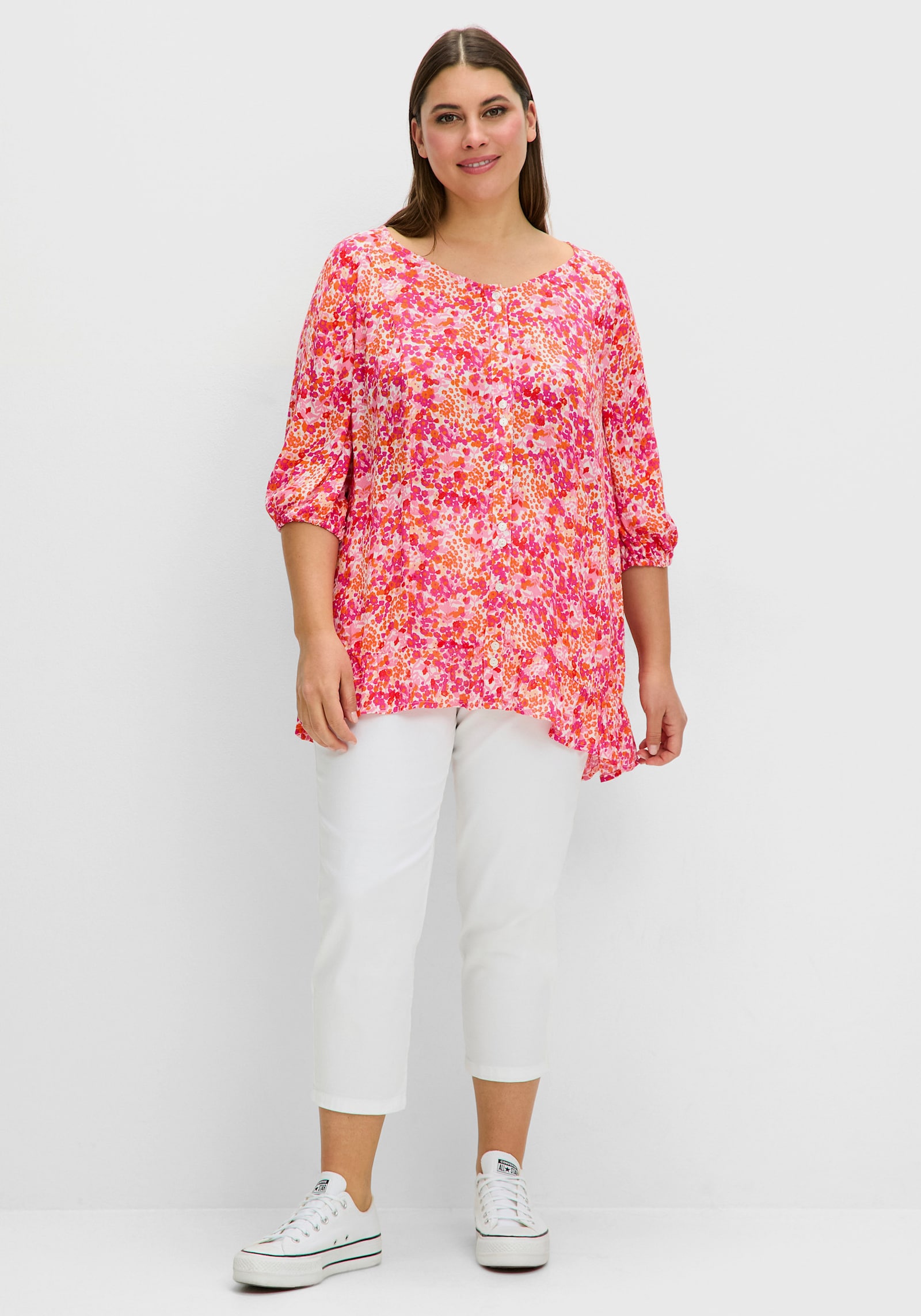 sheego Druckbluse in Crêpe-Qualität, mit Volant am Saum - pink gemustert