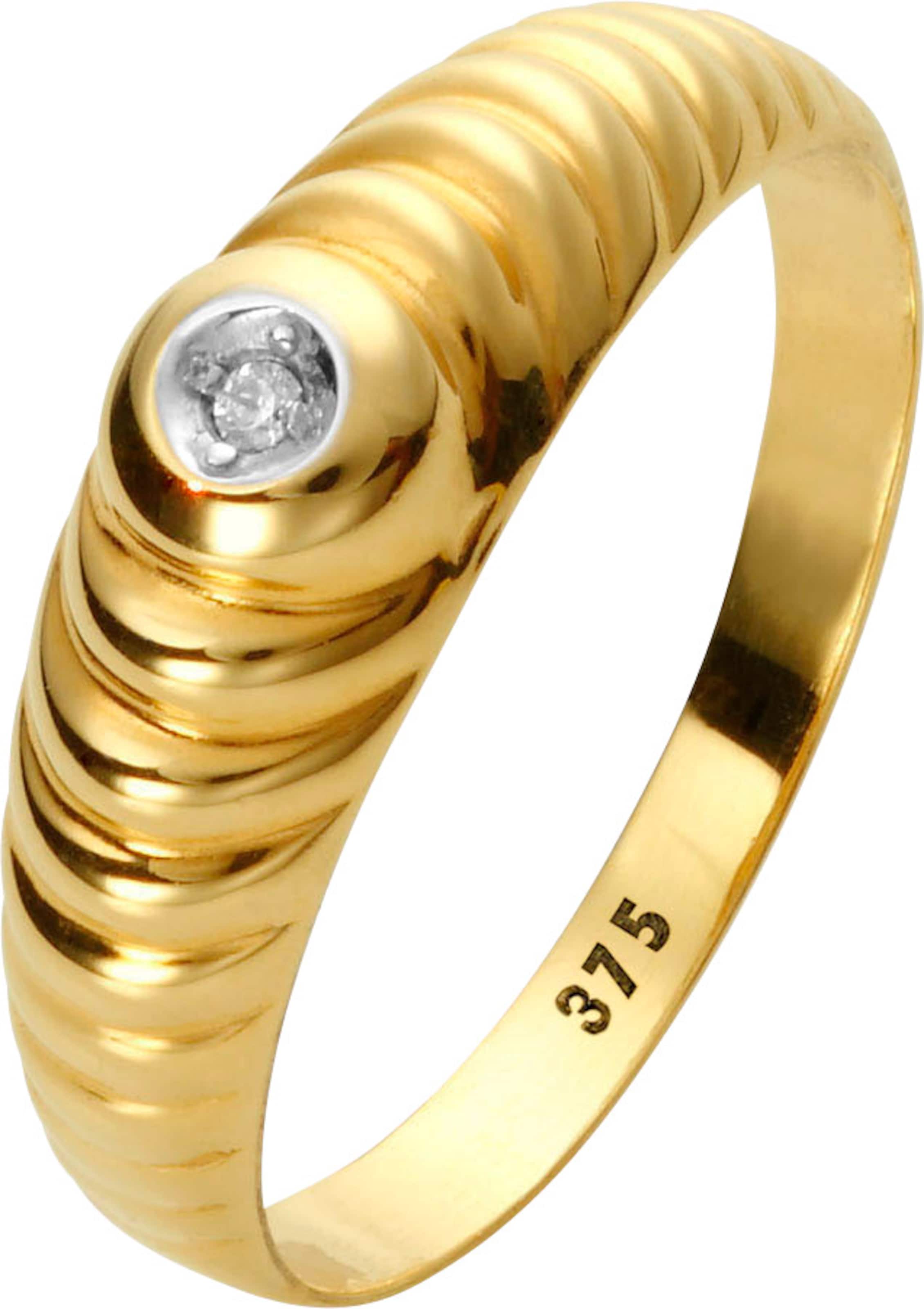 Glatt/Fein günstig Kaufen-Ring in Gelbgold 375 von heine. Ring in Gelbgold 375 von heine <![CDATA[Fein strukturierter Ring mit einem Diamant. Aus 375er Gelbgold. Breite ca. 5 mm.]]>. 