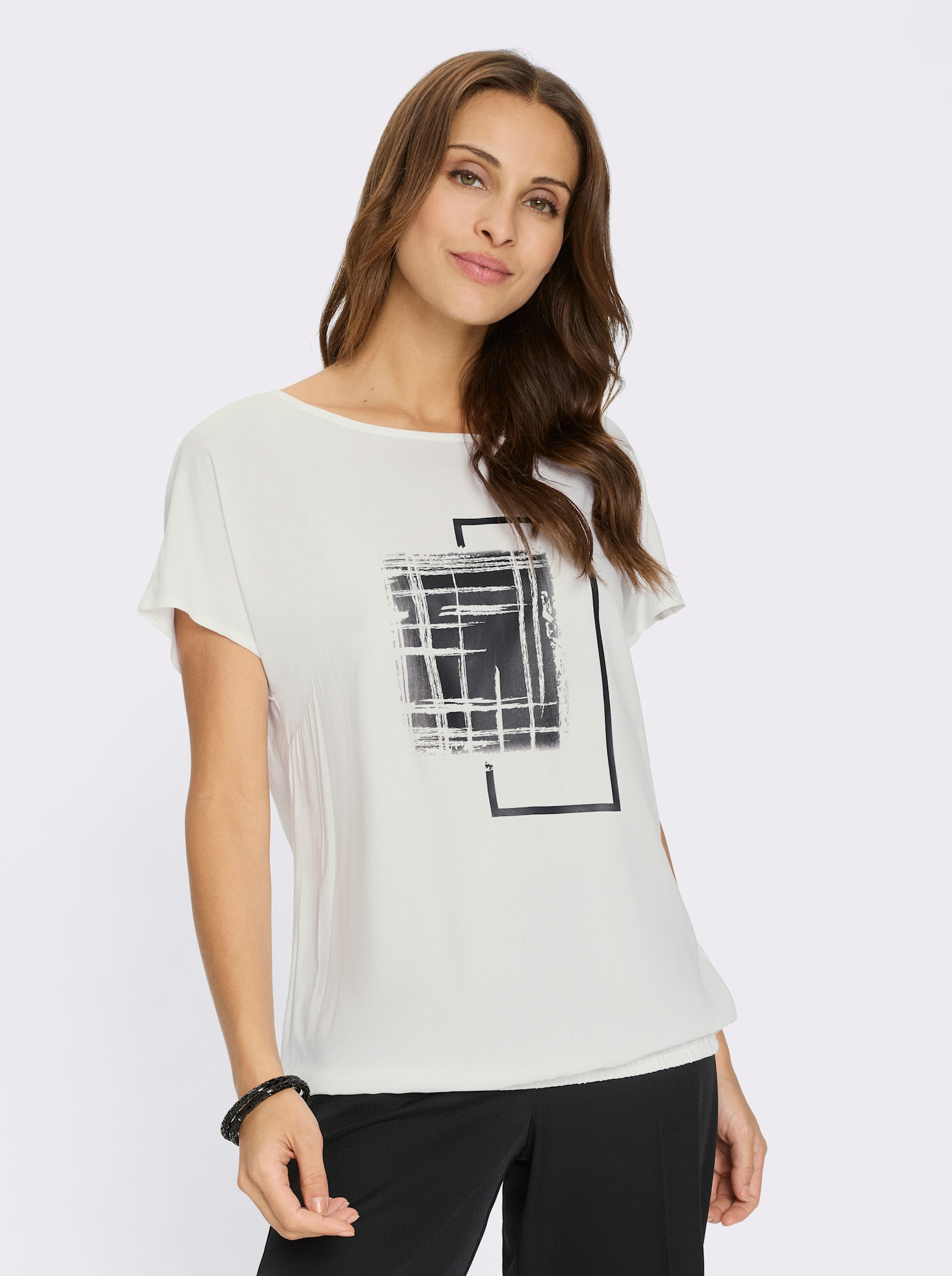 Schlupfbluse mit überschnittenen Schultern - weiß-schwarz-bedruckt