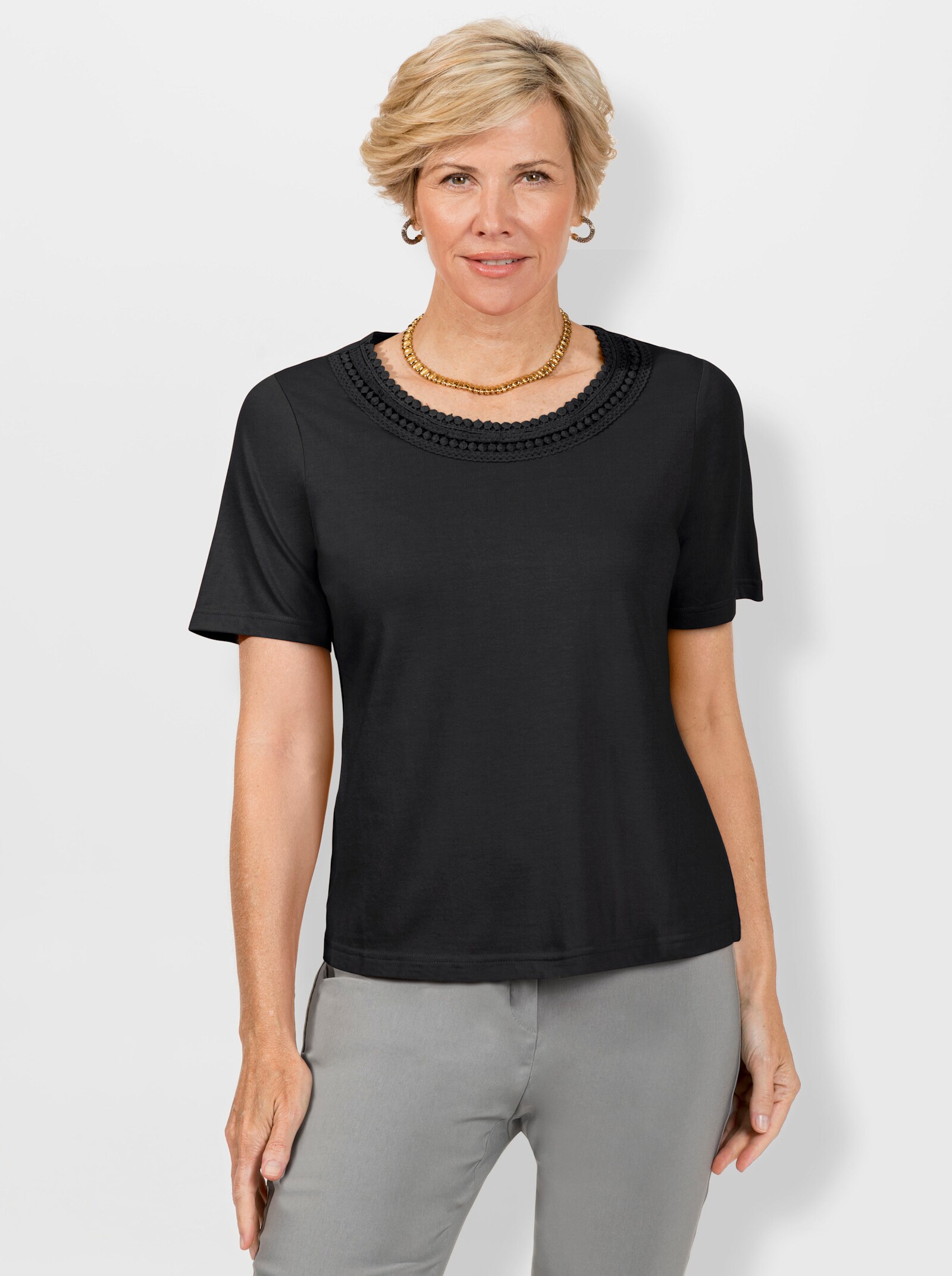 Rundhalsshirt mit Spitzen-Verzierung - schwarz