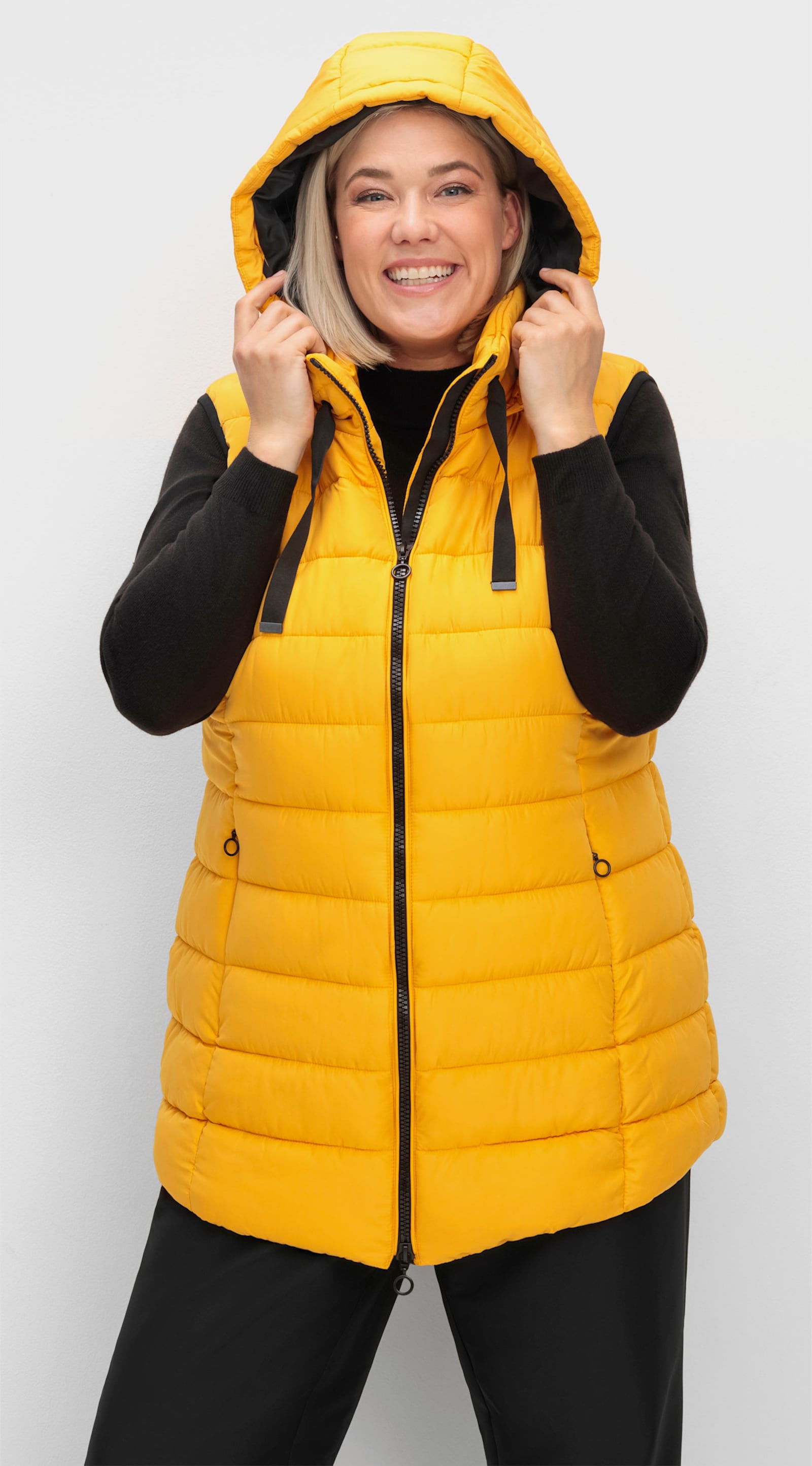 Steppweste mit abzippbarer Kapuze - ocker