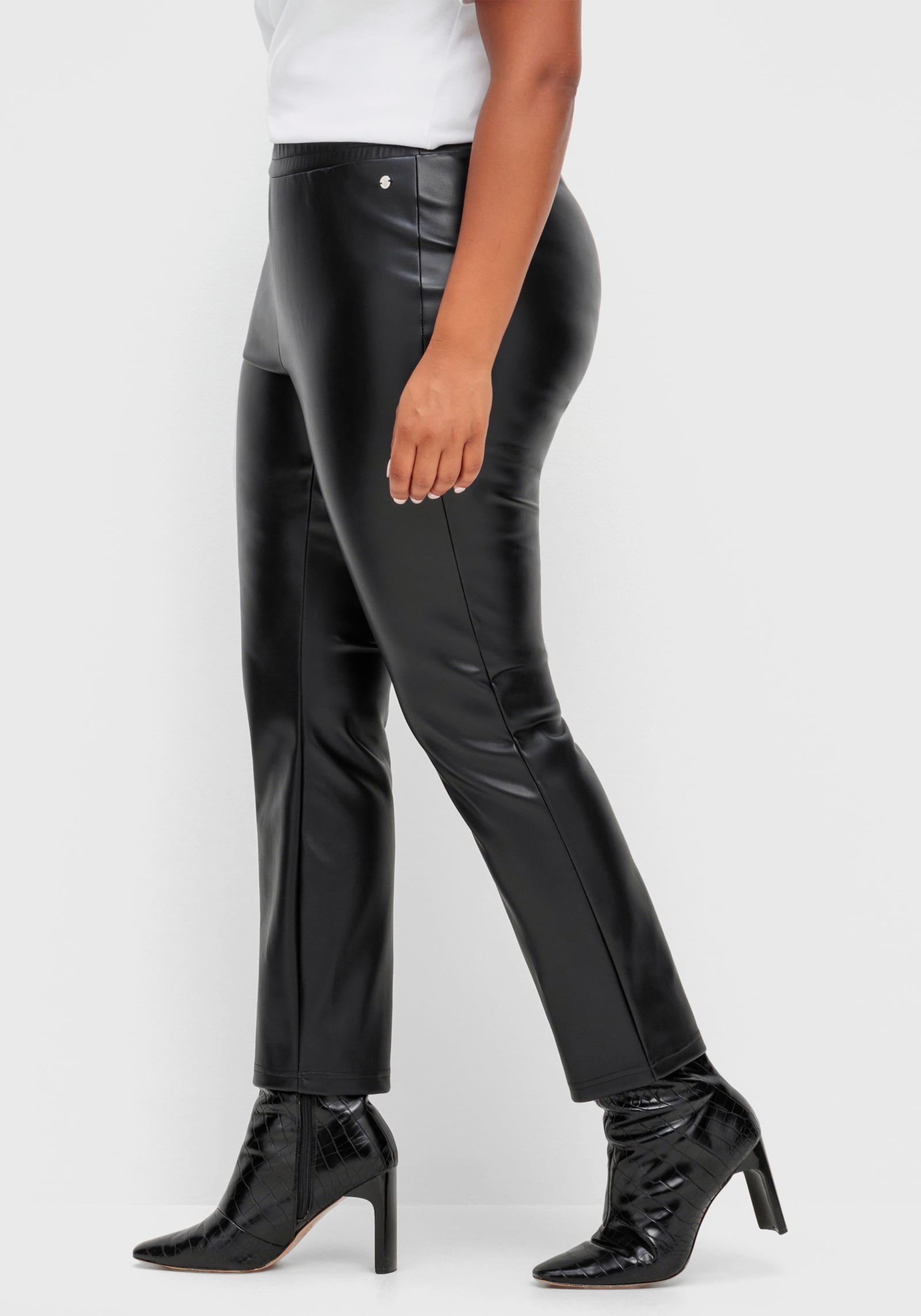 sheego Leggings mit glänzender Beschichtung - schwarz