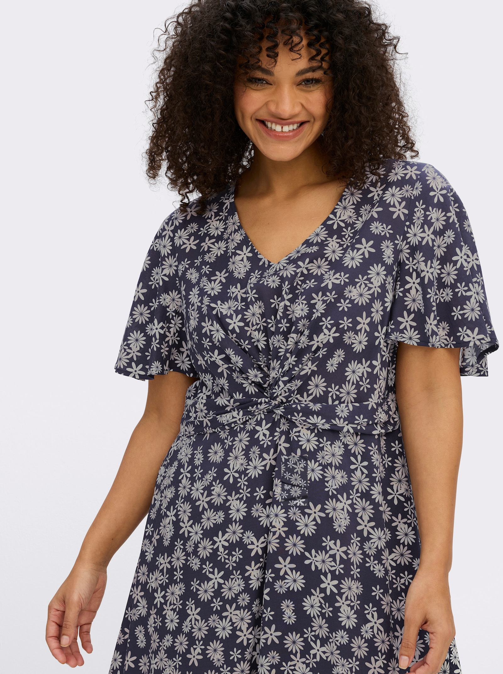 sheego Blumenkleid mit Knotendetail - tiefblau-champagner-bedruckt