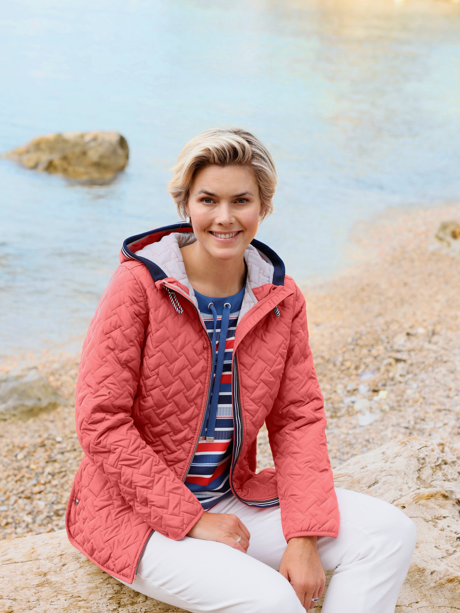 Steppjacke mit Kapuze - grapefruit