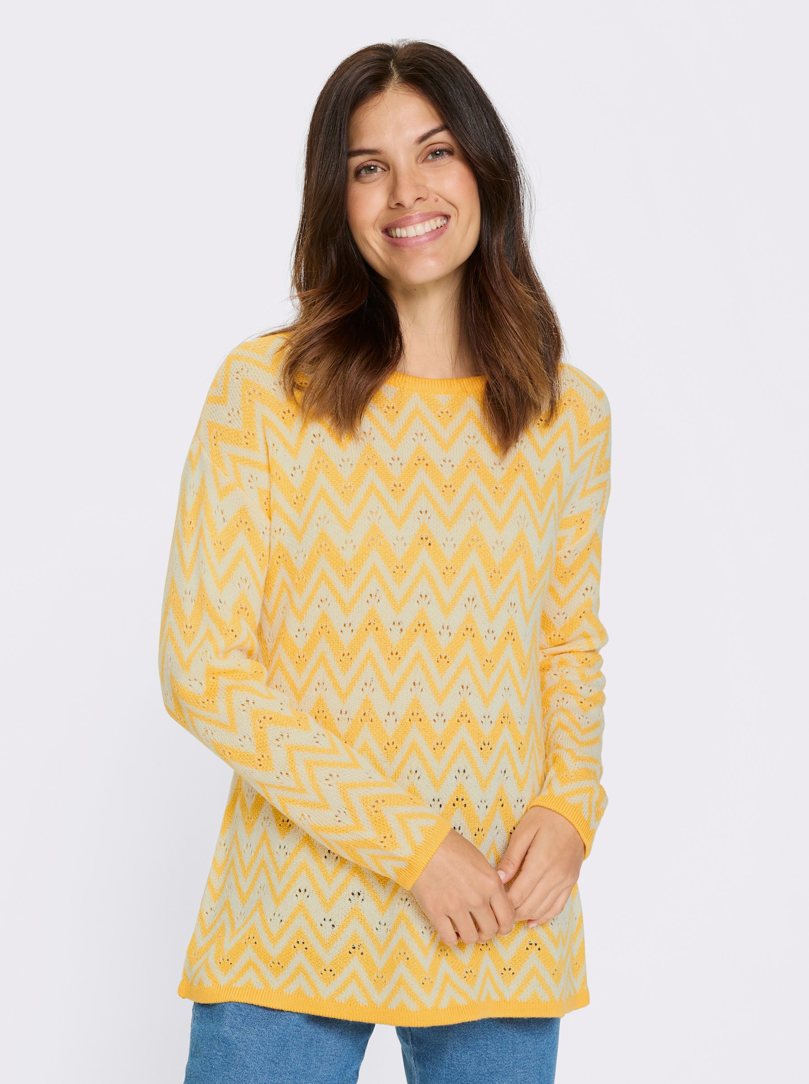Lange pullover met zigzag- en ajourpatroon - geel/wit gedessineerd