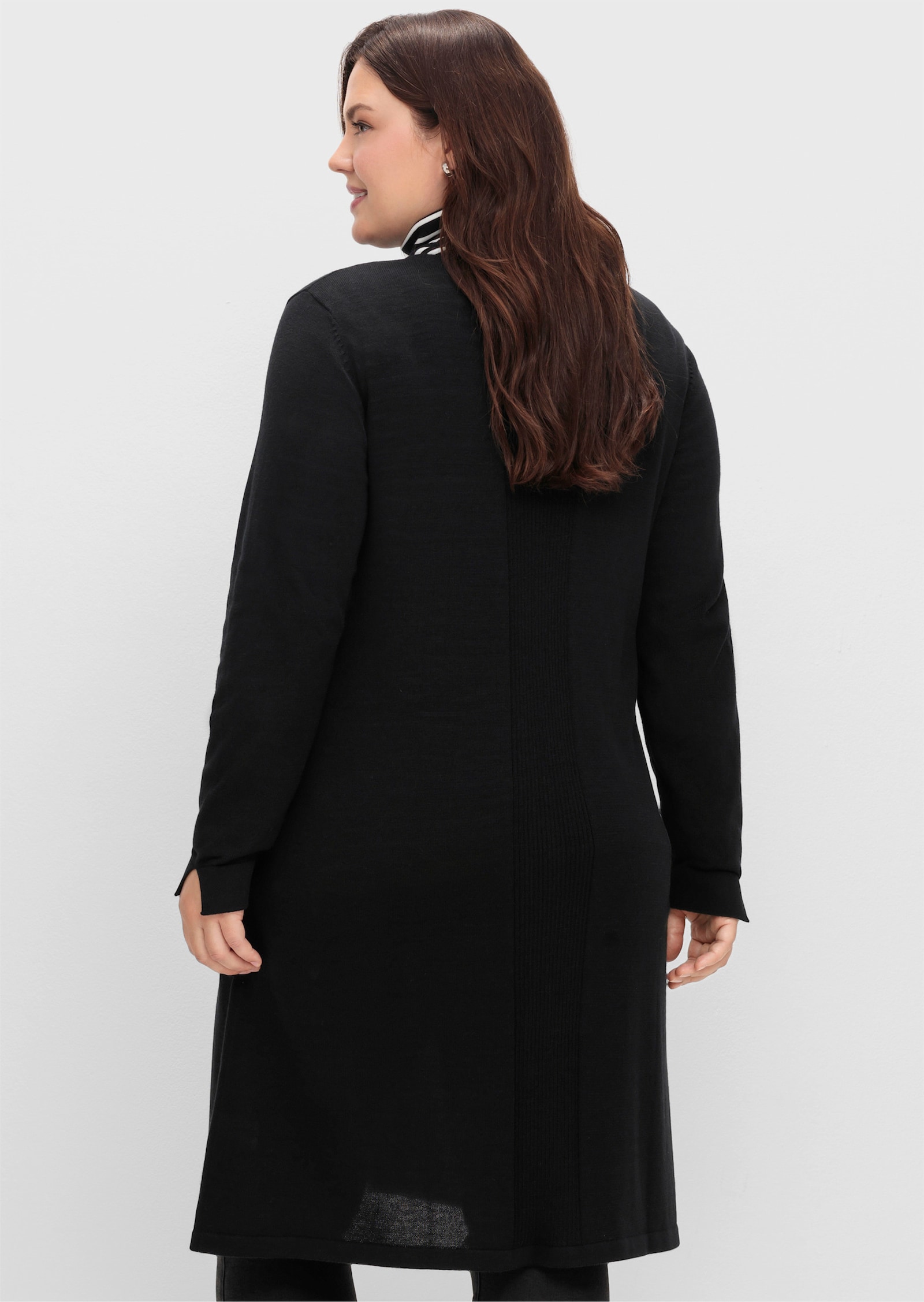 sheego Longpullover mit langem Schlitz vorne - schwarz