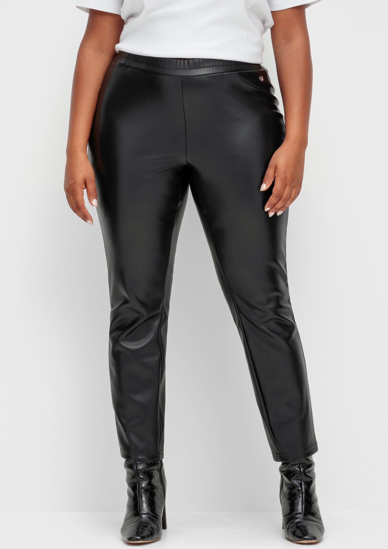 sheego Leggings mit glänzender Beschichtung - schwarz
