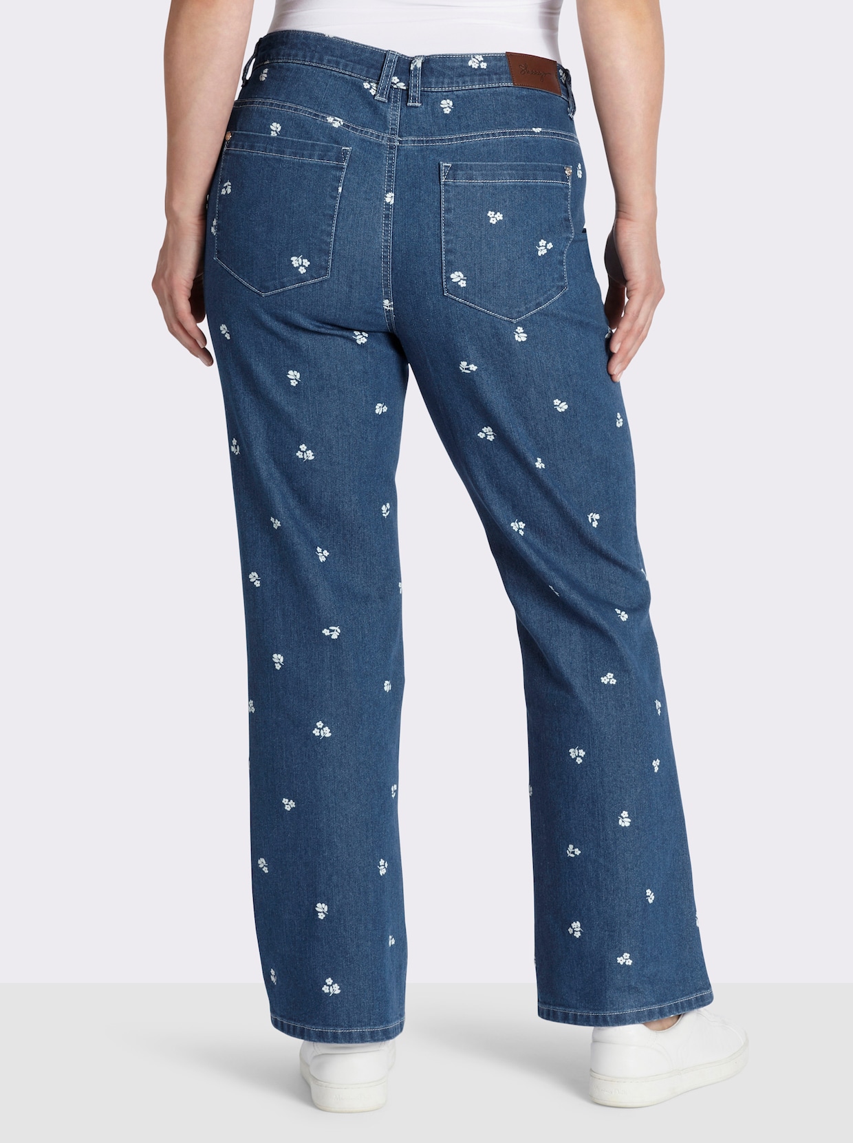 sheego Jean bootcut avec imprimé floral - bleu blanchi