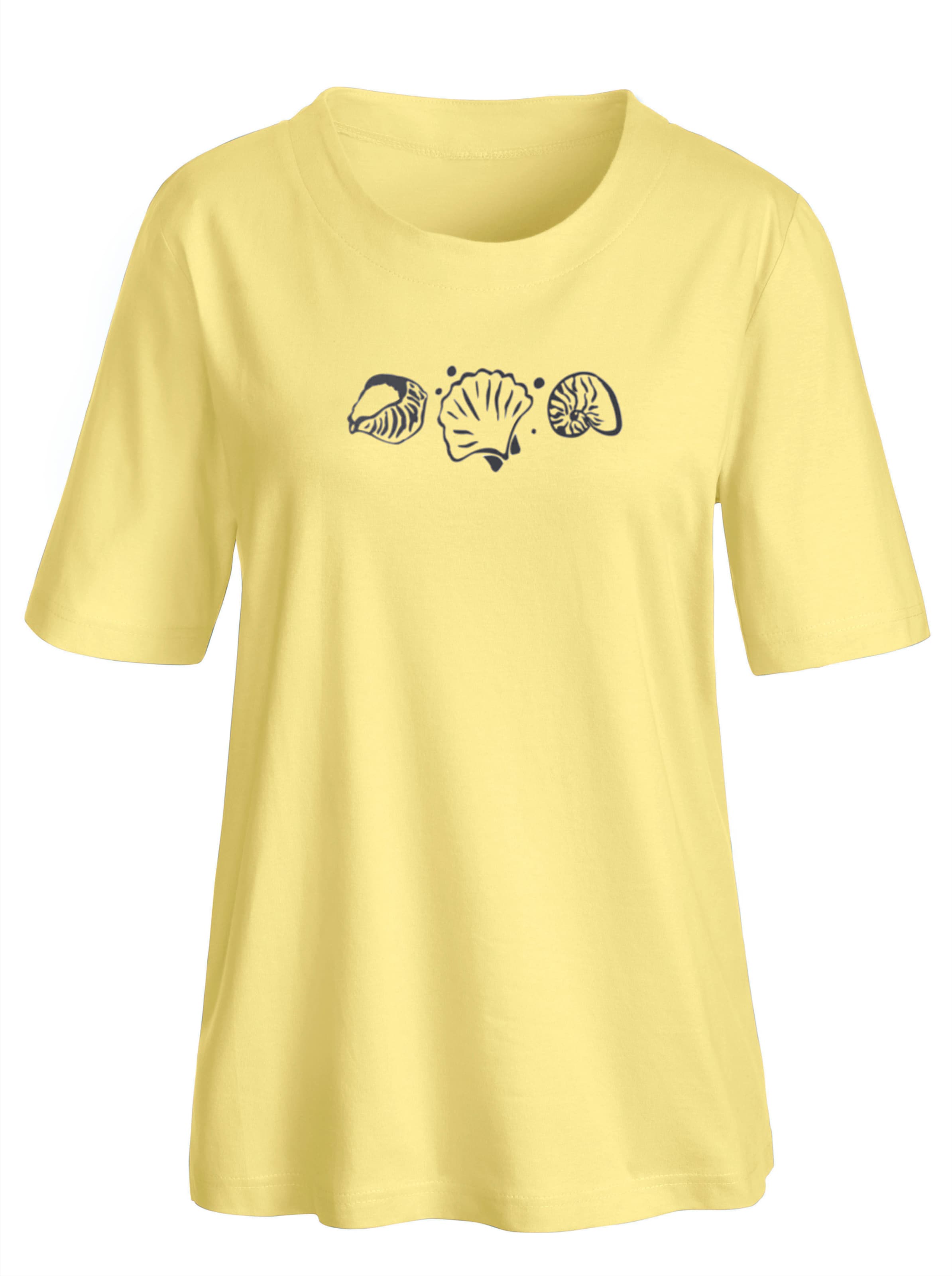Arm Shirt günstig Kaufen-Kurzarmshirt in zitrone von heine. Kurzarmshirt in zitrone von heine <![CDATA[Shirt mit Muscheldruck vorne. Seitenschlitze.]]>. 