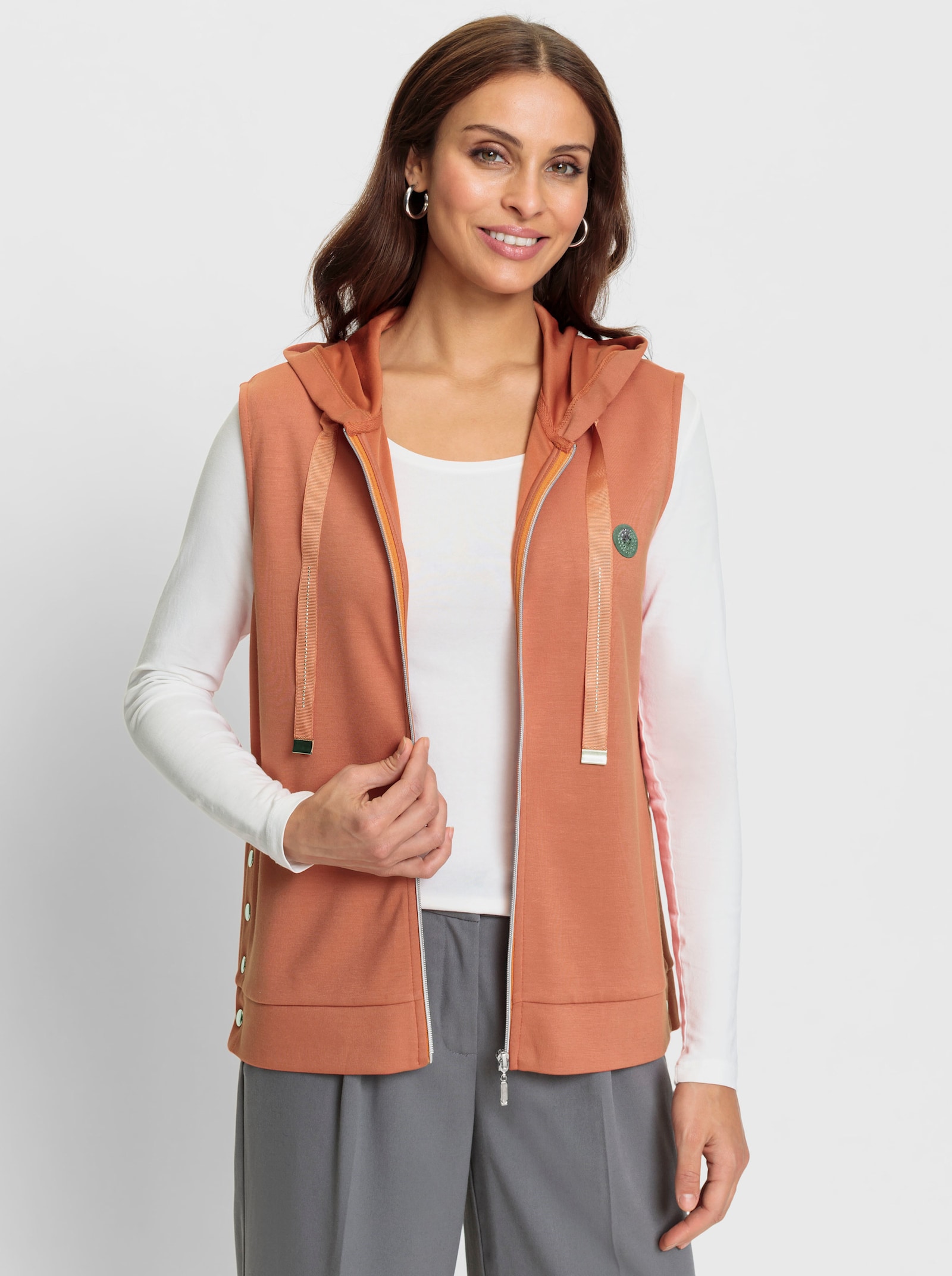 Sweatvest met drukknopen in de zijsplitten - papaya