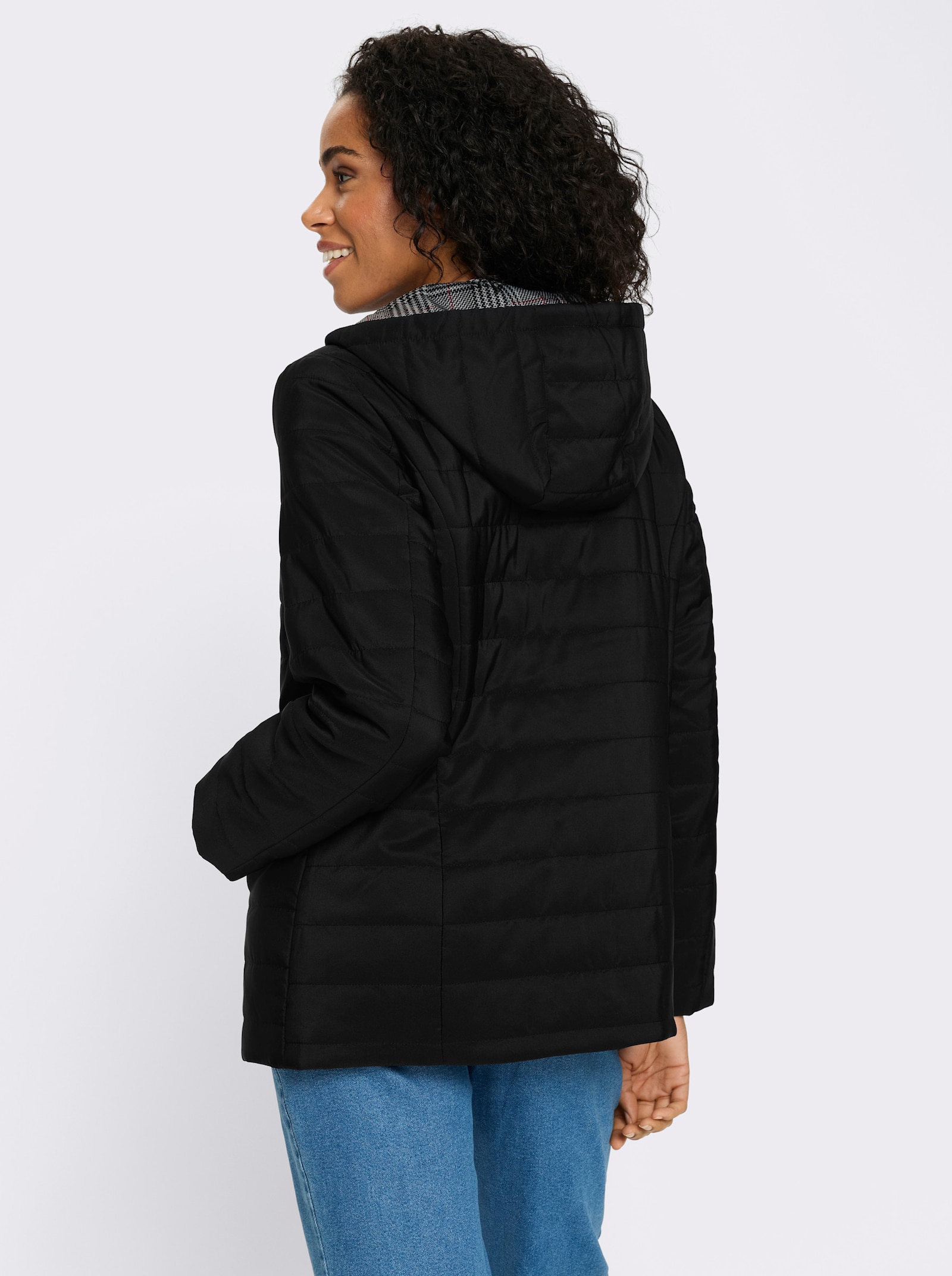 Steppjacke mit bedrucktem Futter - schwarz