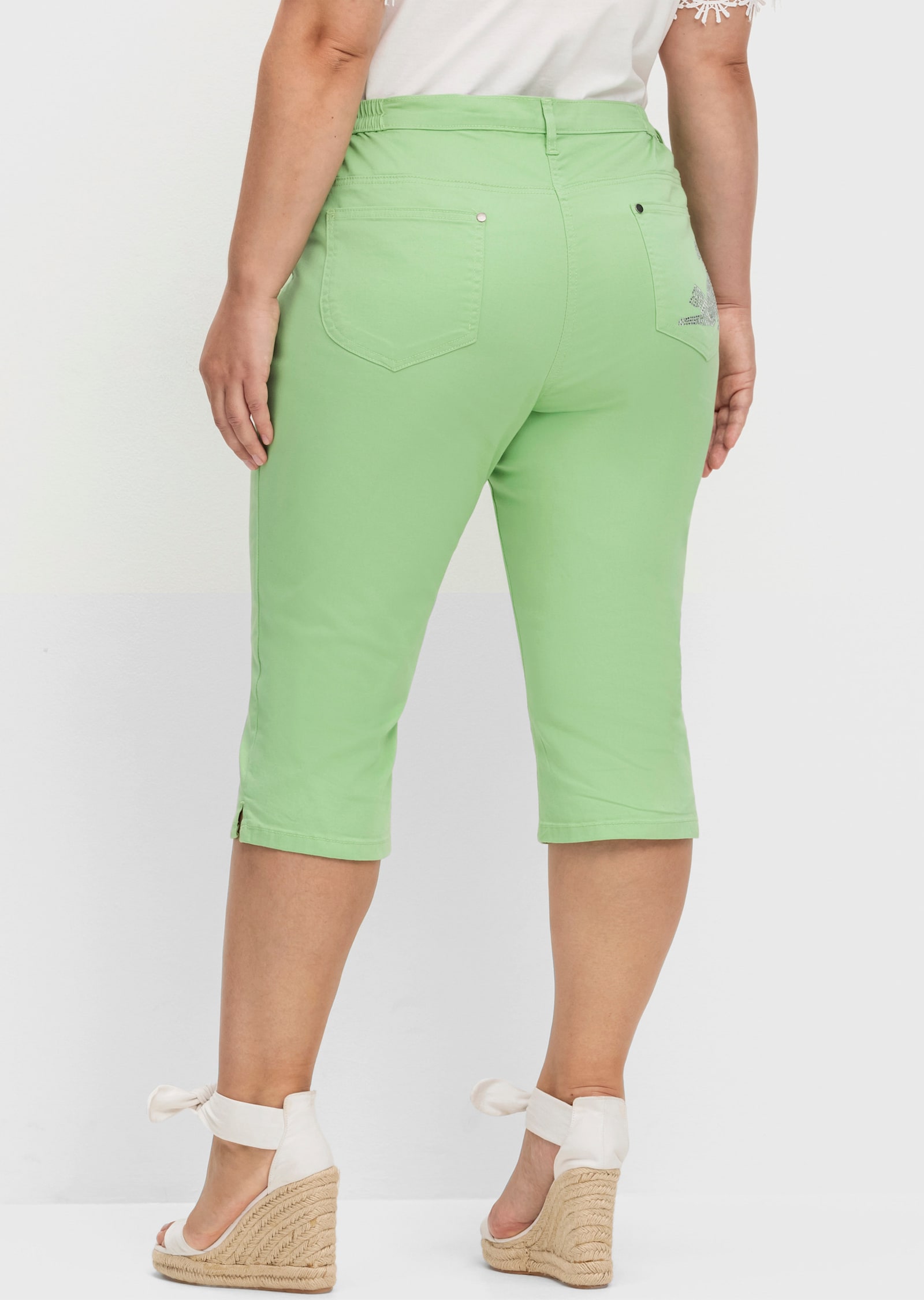 Caprijeans mit glitzerndem Katzenmotiv - reseda